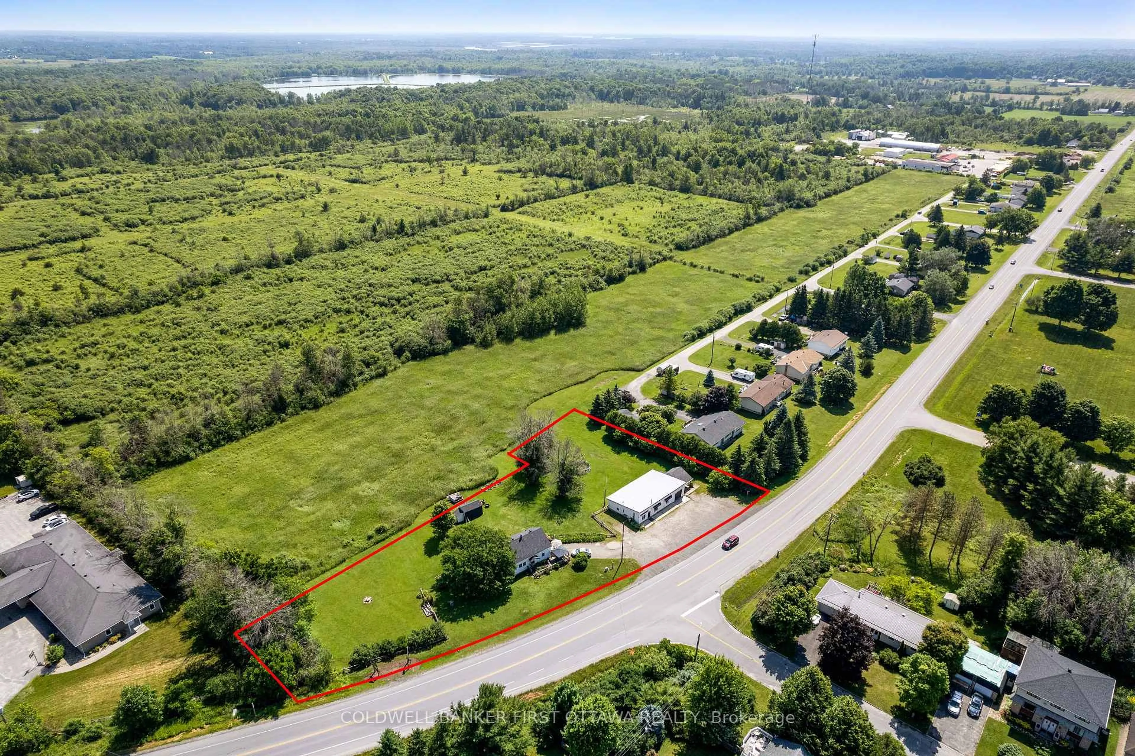 A pic from outside/outdoor area/front of a property/back of a property/a pic from drone, water/lake/river/ocean view for 3004 Rideau Ferry Rd, Perth Ontario K7H 0H3