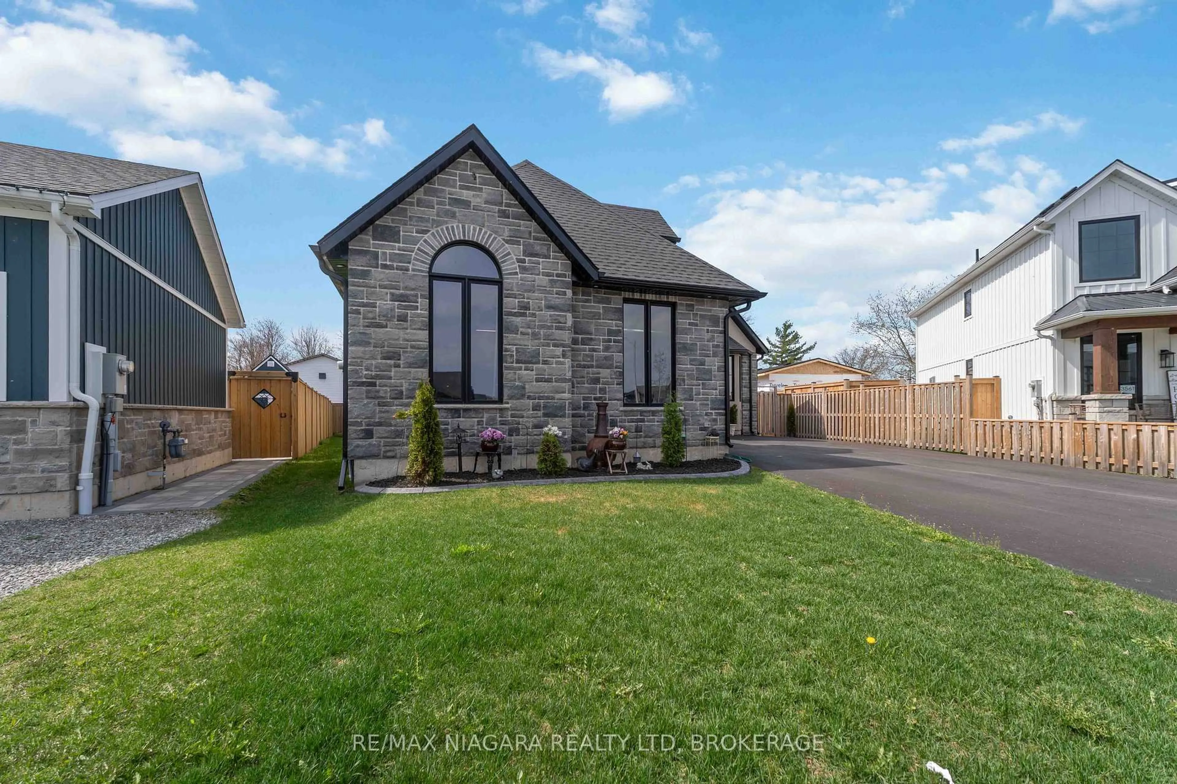 Home with brick exterior material, street for 3555 CANFIELD Cres, Fort Erie Ontario L0S 1S0