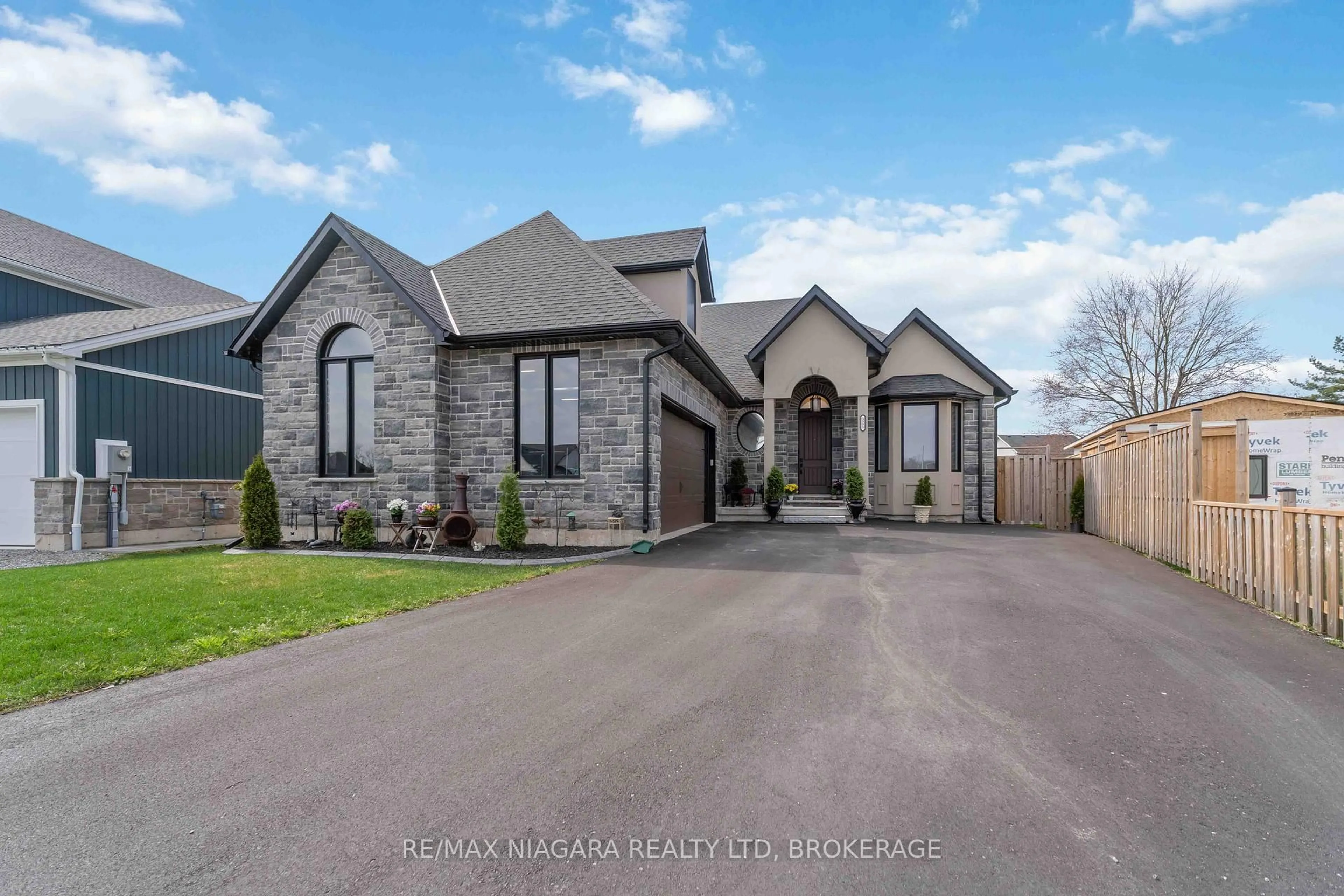 Home with brick exterior material, street for 3555 CANFIELD Cres, Fort Erie Ontario L0S 1S0