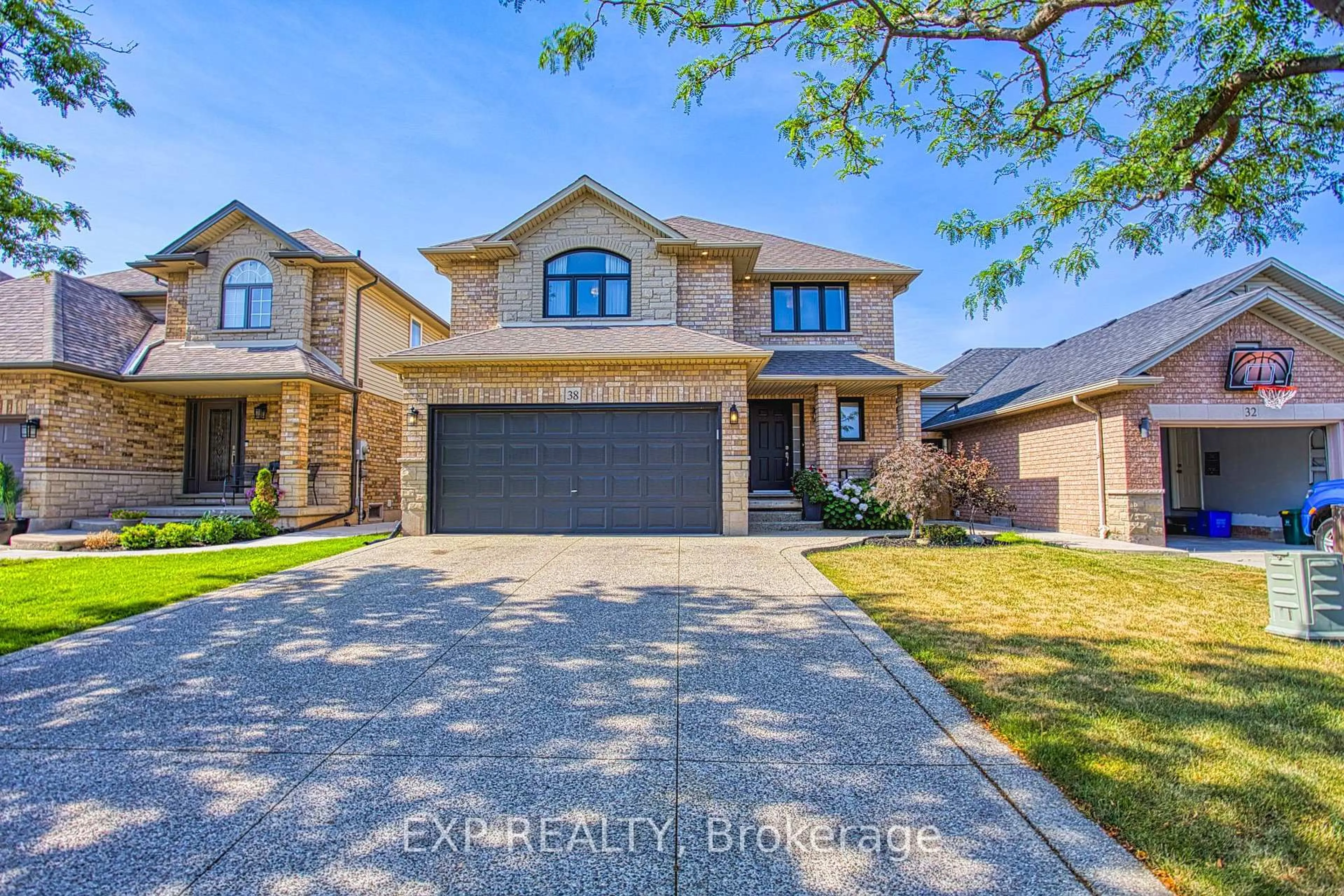 Home with brick exterior material, street for 38 Sonoma Lane, Hamilton Ontario L8E 6B5