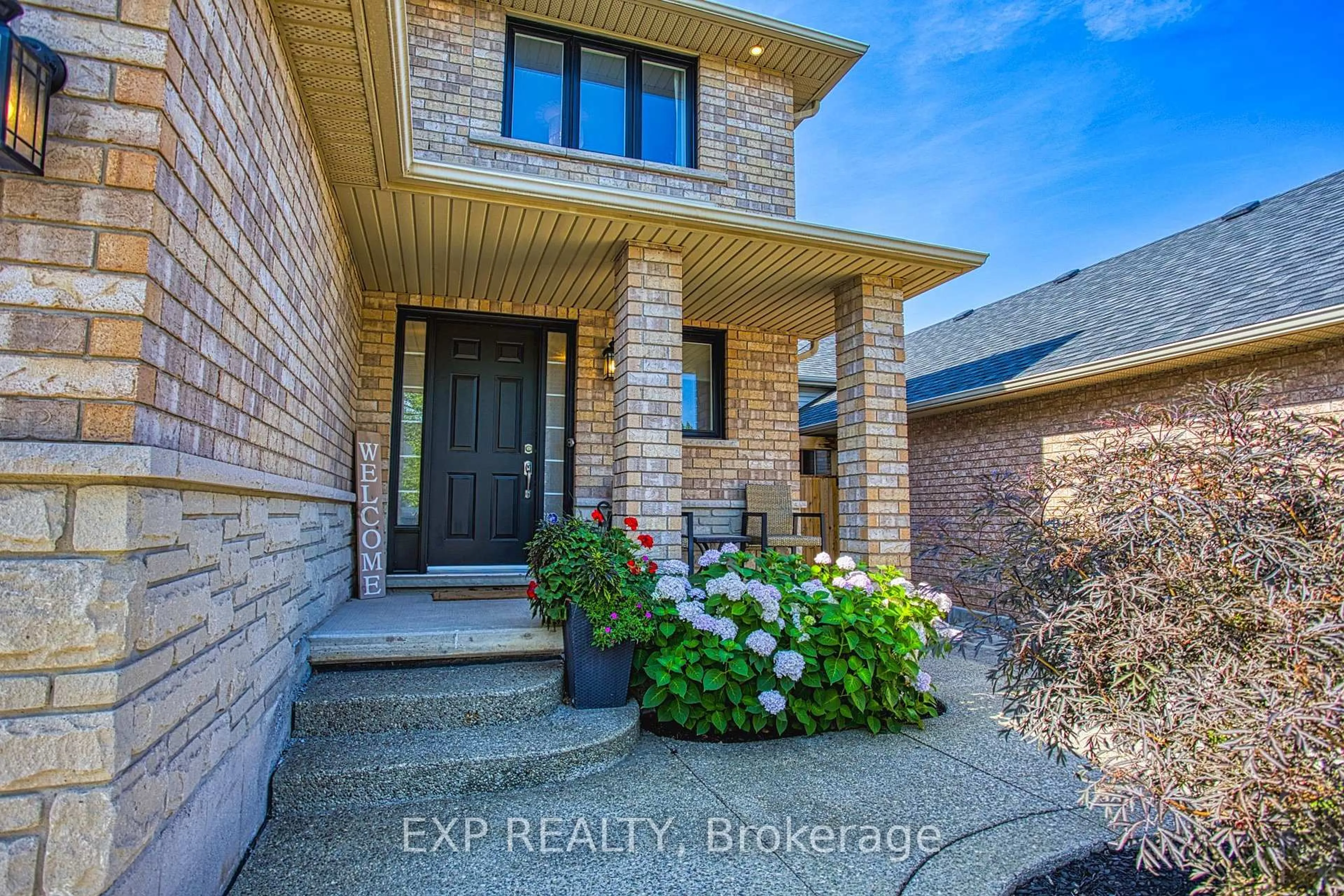 Home with brick exterior material, street for 38 Sonoma Lane, Hamilton Ontario L8E 6B5