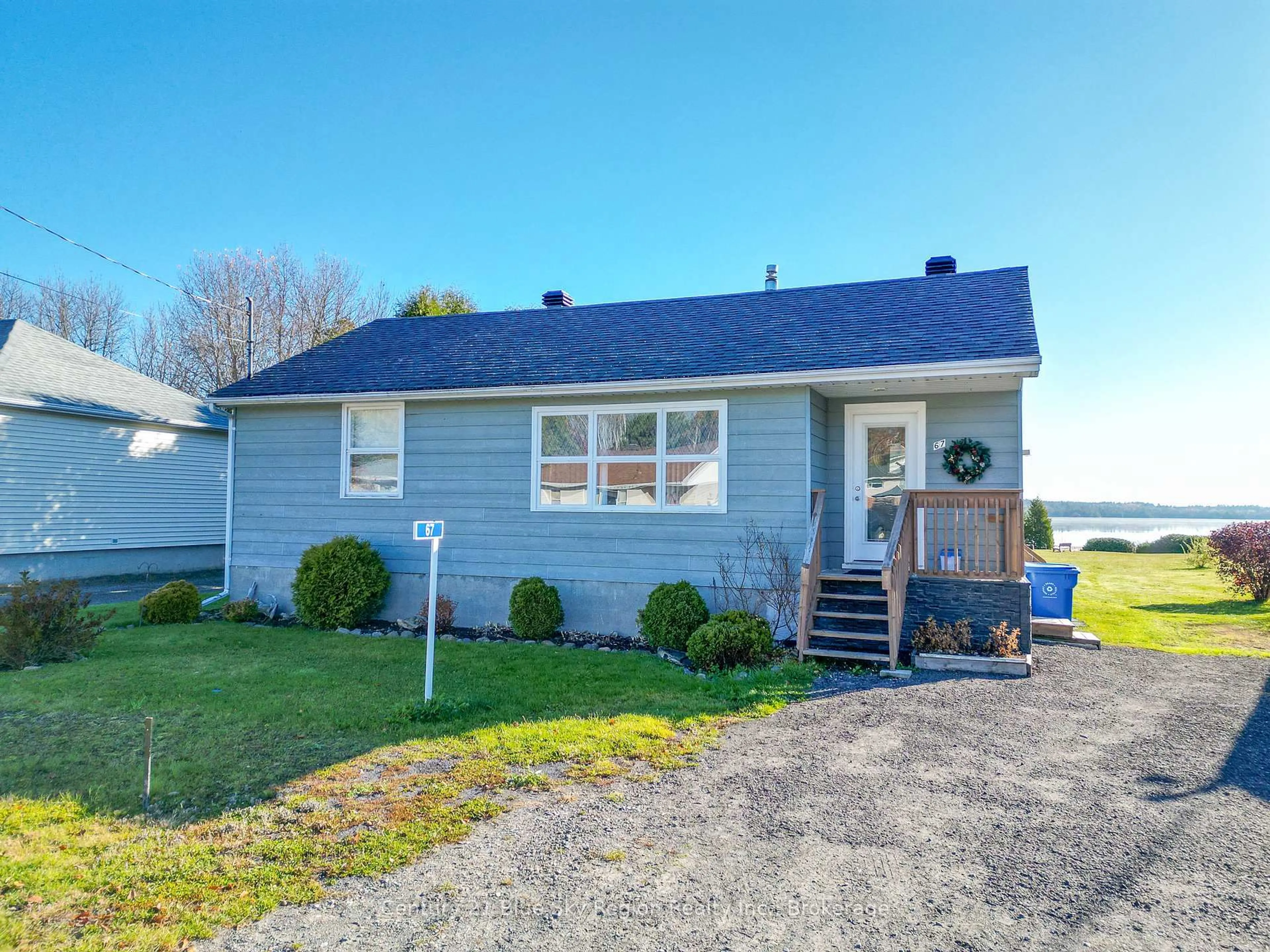 Home with vinyl exterior material, street for 67 Spruce Dr, Temagami Ontario P0H 2H0