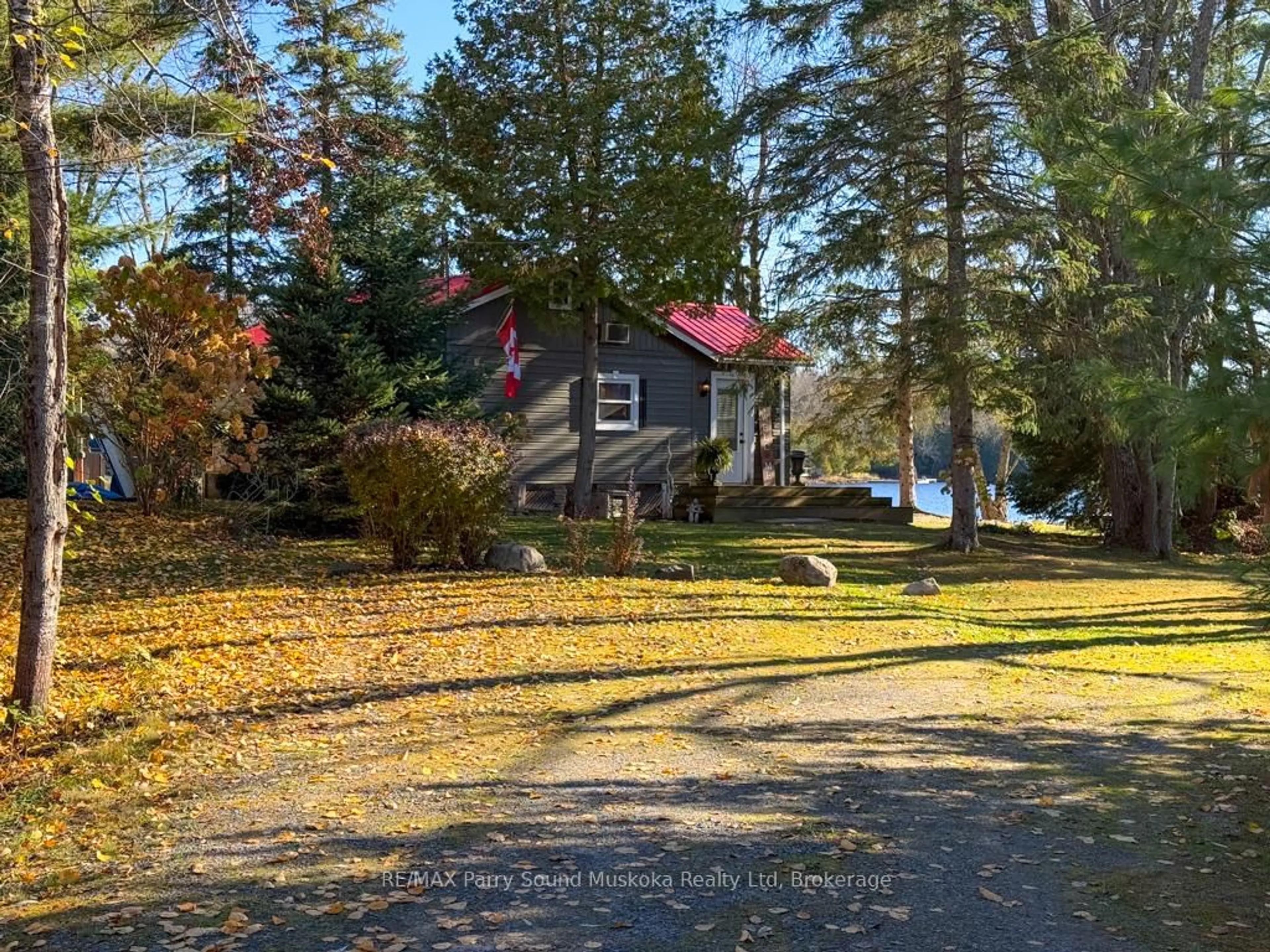 A pic from outside/outdoor area/front of a property/back of a property/a pic from drone, water/lake/river/ocean view for 30 Church St, Whitestone Ontario P0A 1G0