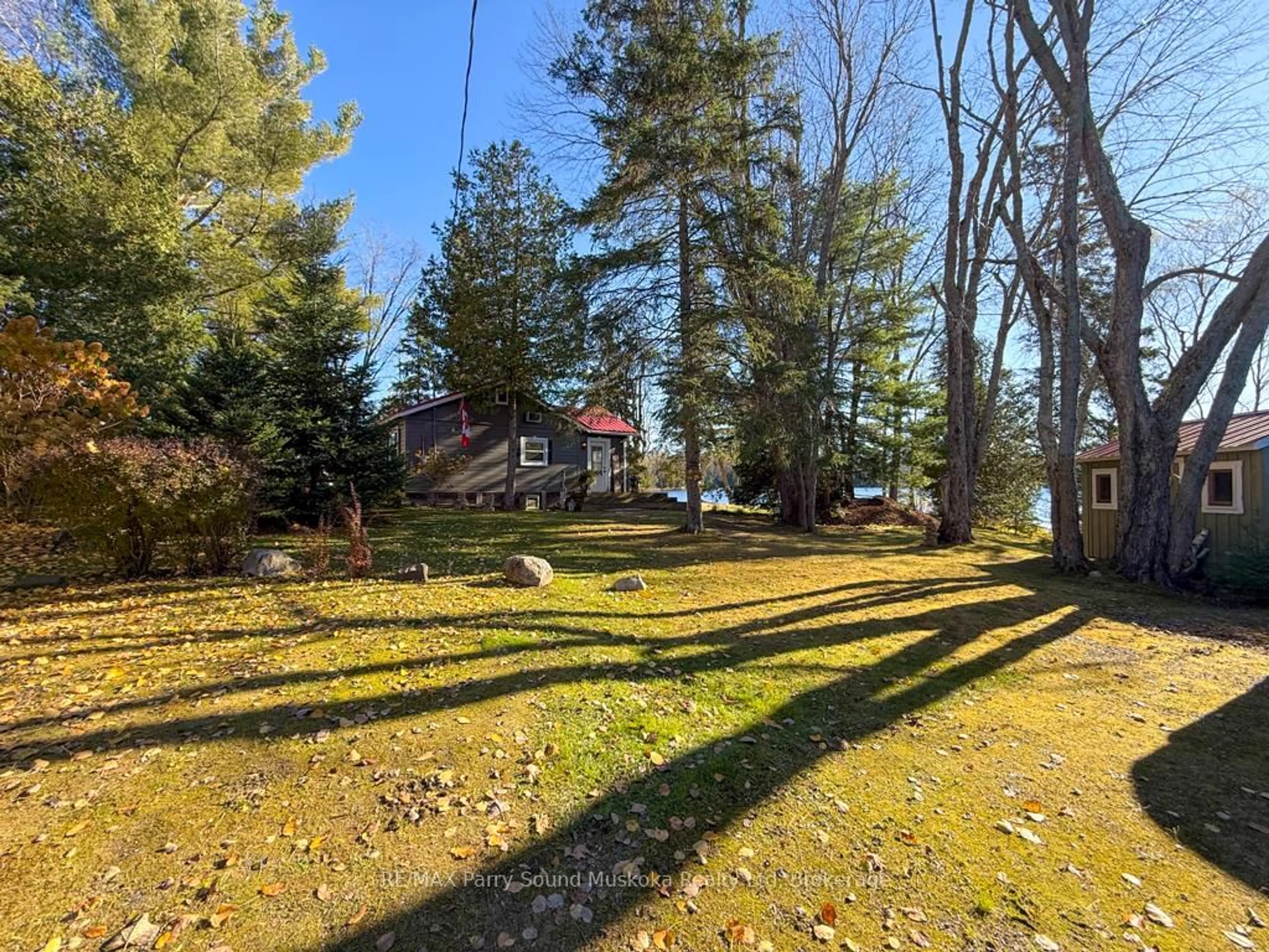 A pic from outside/outdoor area/front of a property/back of a property/a pic from drone, water/lake/river/ocean view for 30 Church St, Whitestone Ontario P0A 1G0