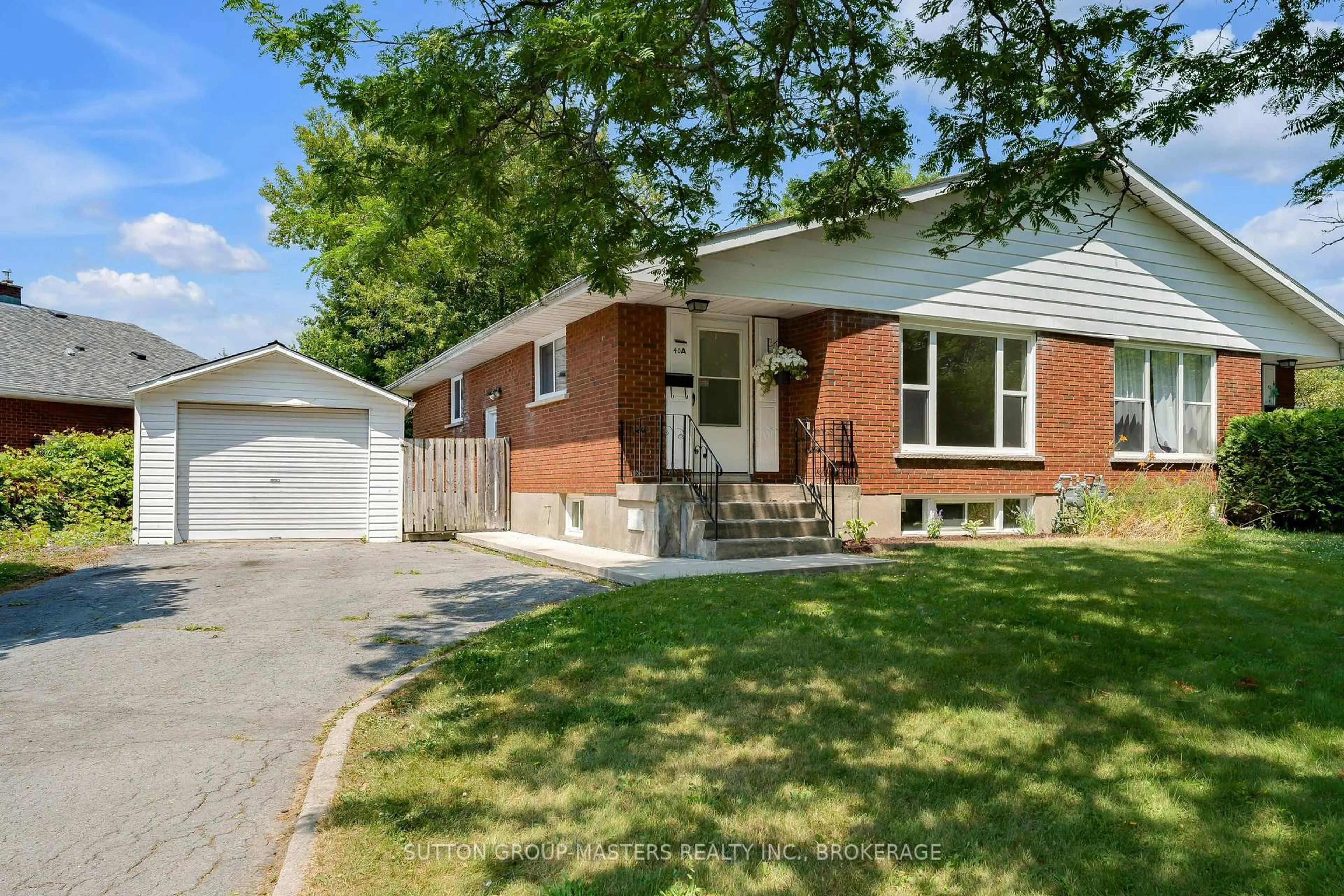 Home with brick exterior material, street for 40 Crescent Dr, Kingston Ontario K7M 4J5