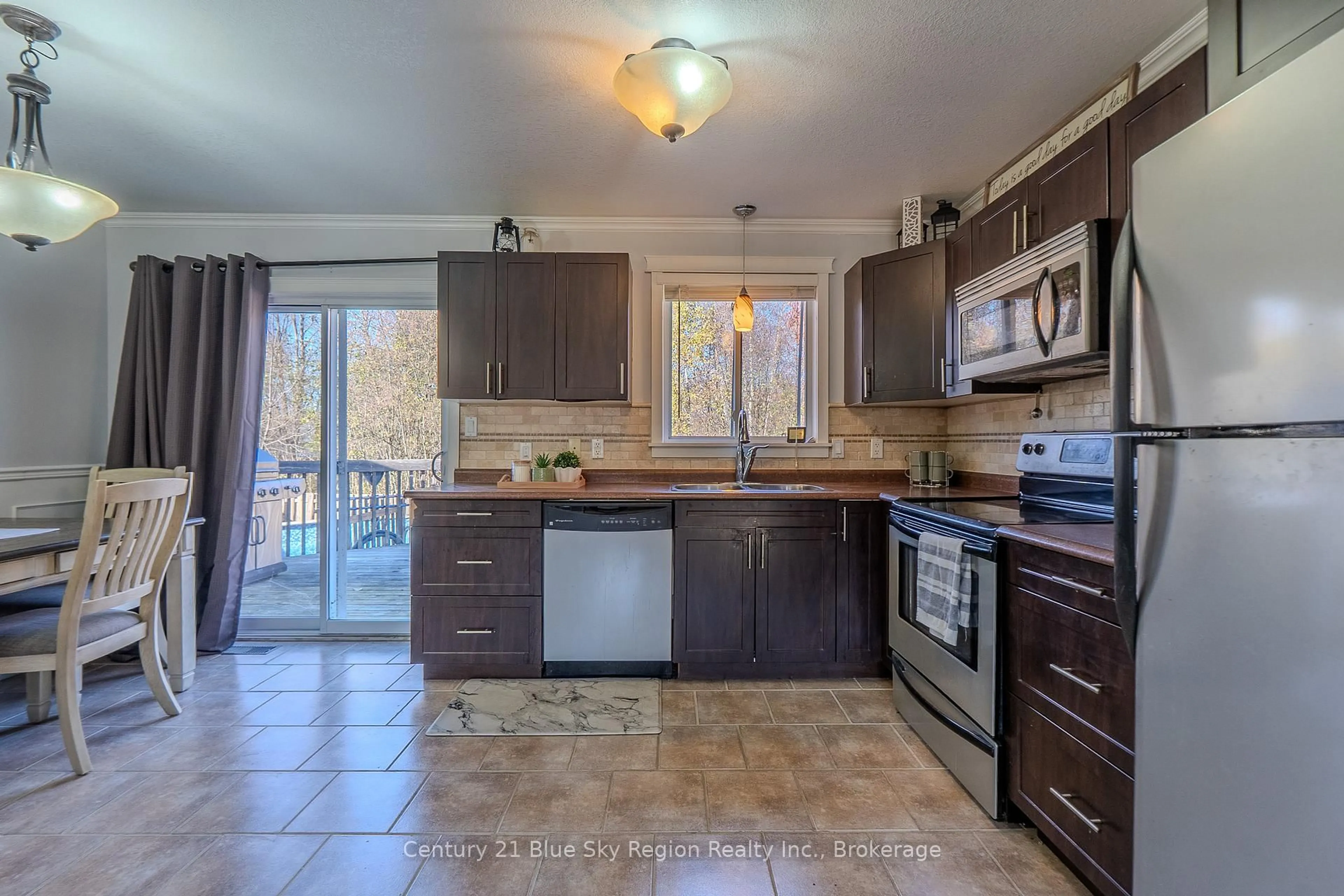 Open concept kitchen, ceramic/tile floor for 557 Demers St, West Nipissing Ontario P2B 0A1