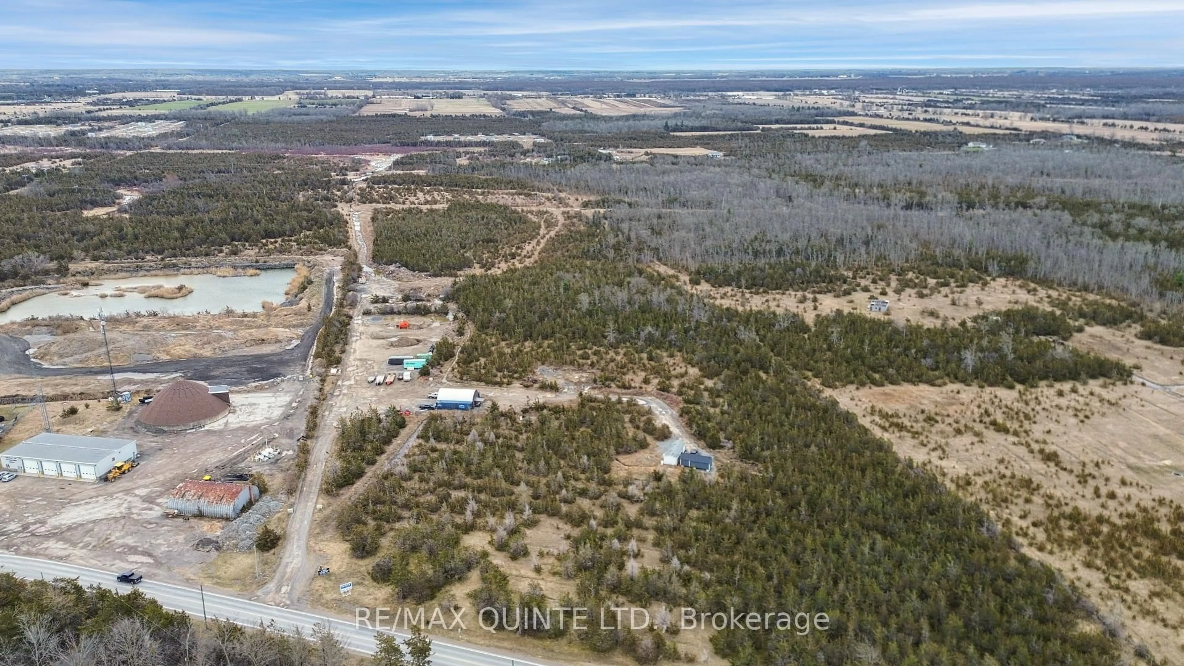 A pic from outside/outdoor area/front of a property/back of a property/a pic from drone, forest/trees view for 55 County Road 14, Prince Edward County Ontario K0K 1W0
