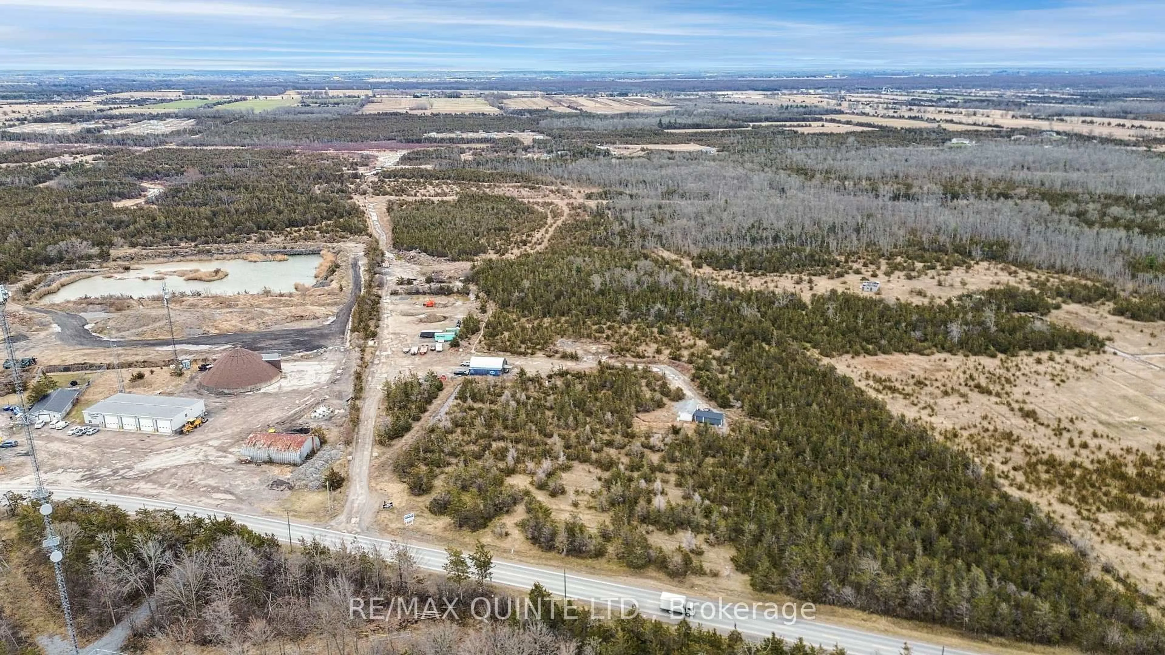 A pic from outside/outdoor area/front of a property/back of a property/a pic from drone, unknown for 55 County Road 14, Prince Edward County Ontario K0K 1W0