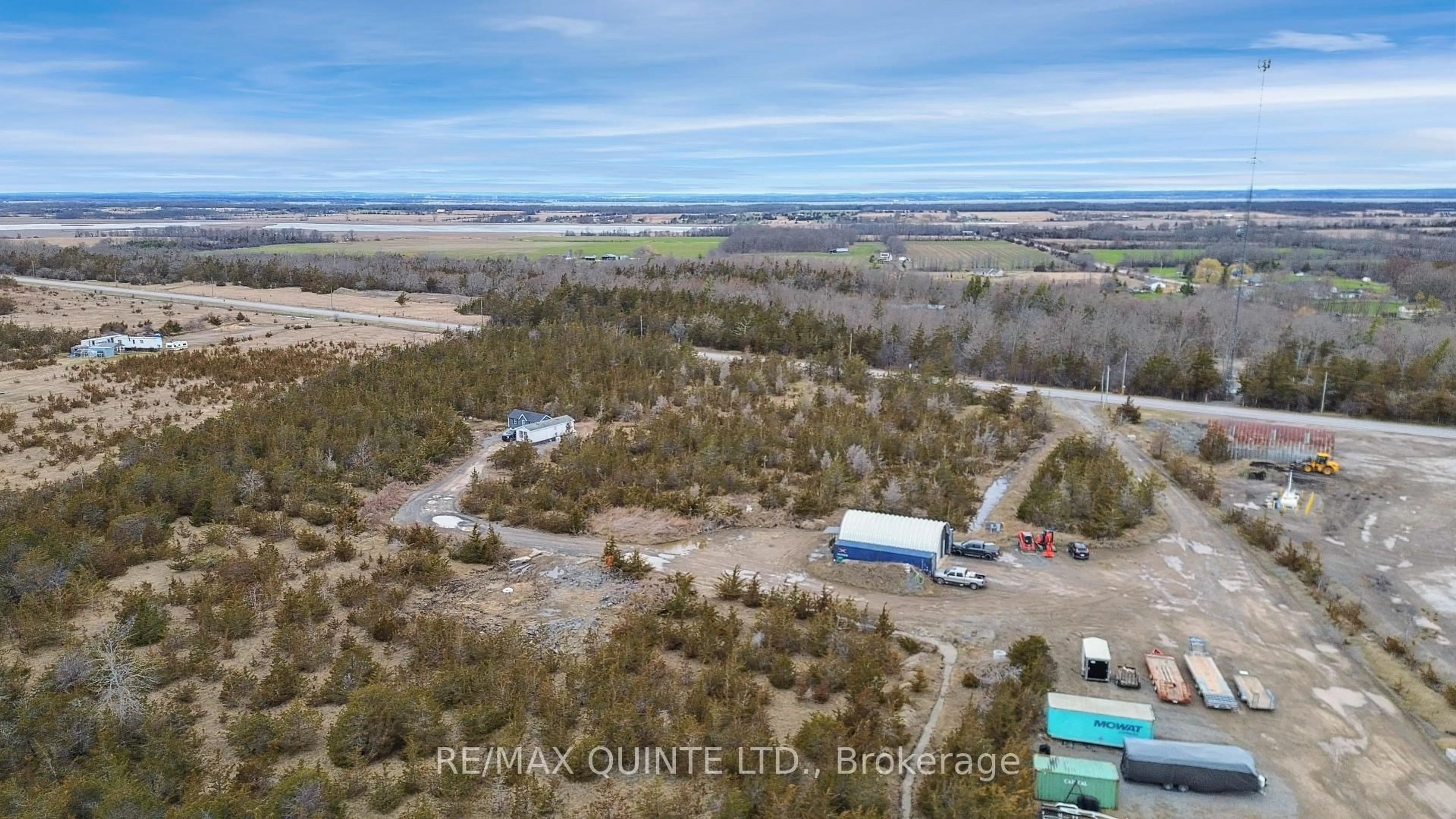 A pic from outside/outdoor area/front of a property/back of a property/a pic from drone, unknown for 55 County Road 14, Prince Edward County Ontario K0K 1W0