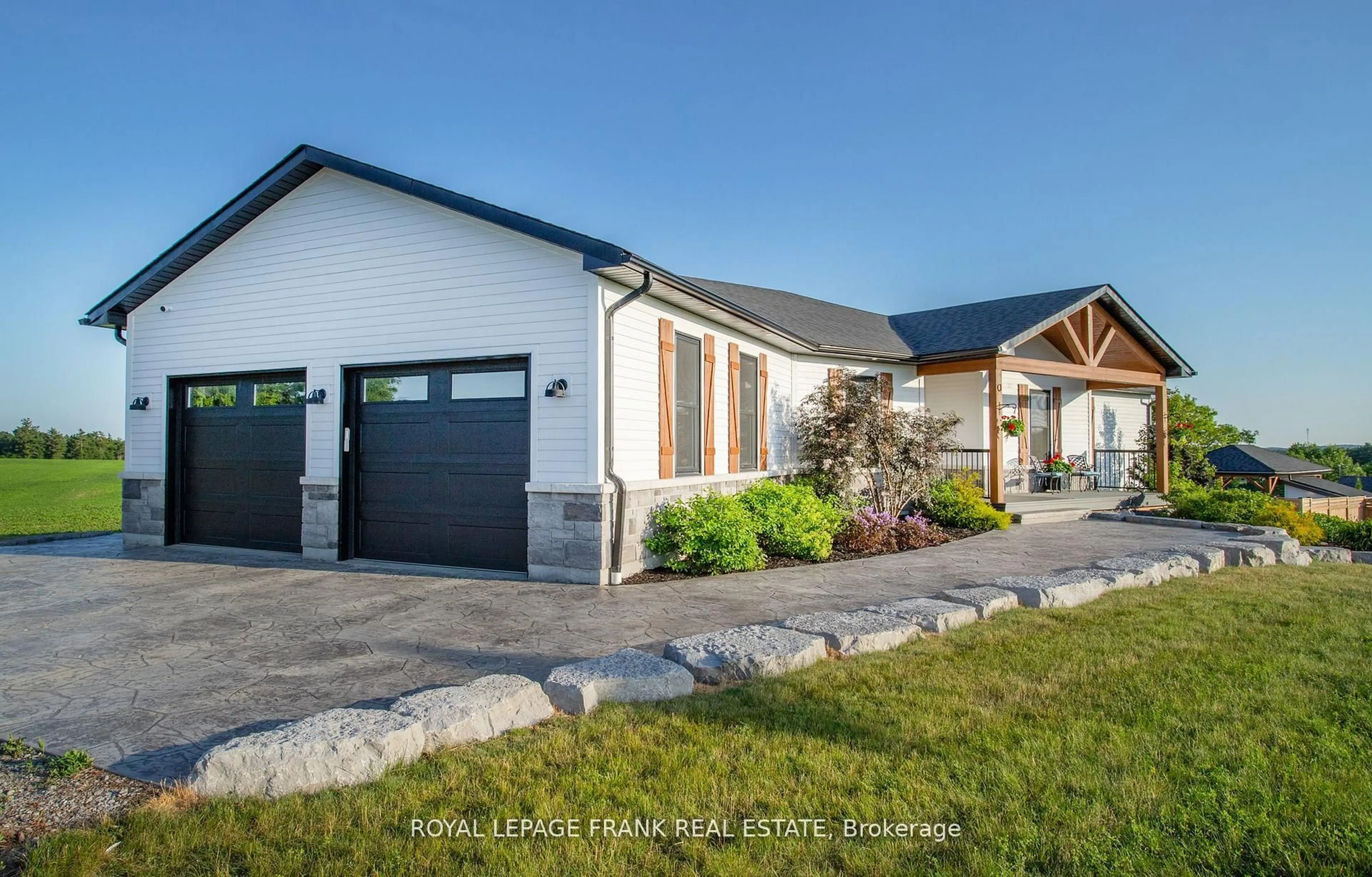 Home with vinyl exterior material, street for 621 Mount Pleasant Rd, Cramahe Ontario K0K 1M0