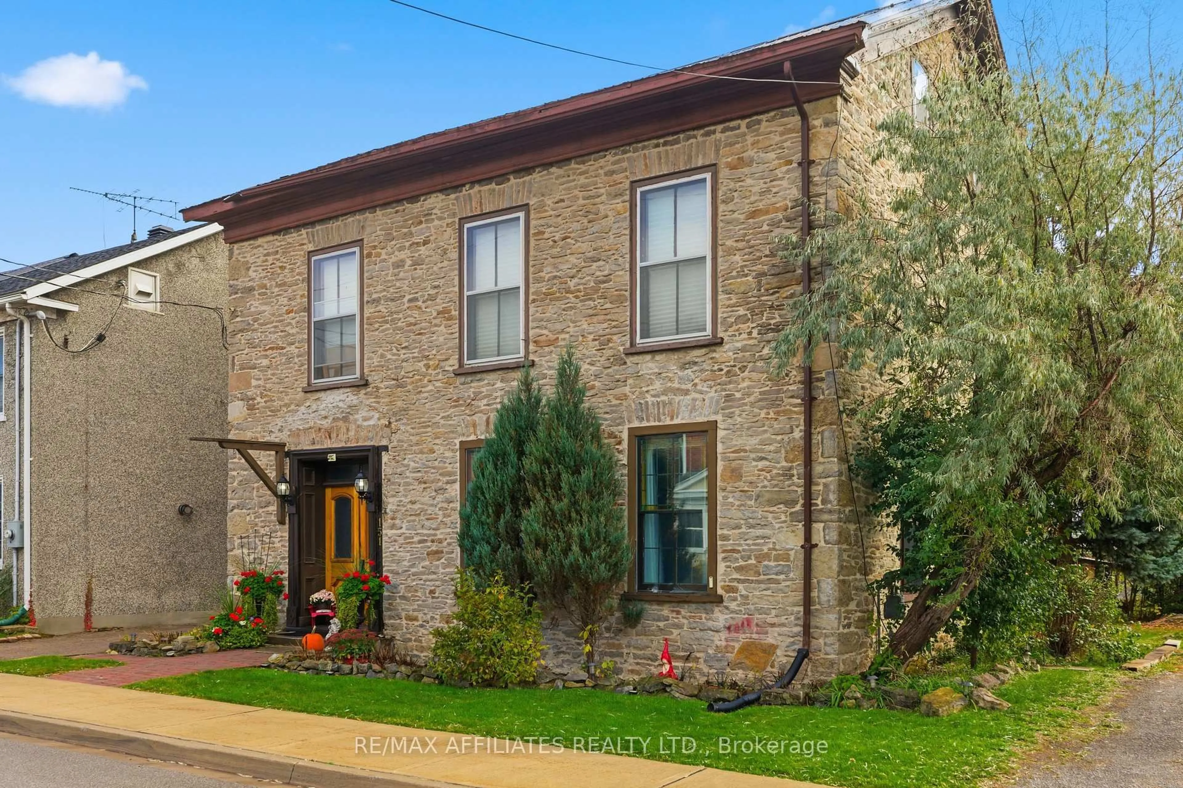 Home with brick exterior material, street for 151 Henry St, Prescott Ontario K0E 1T0