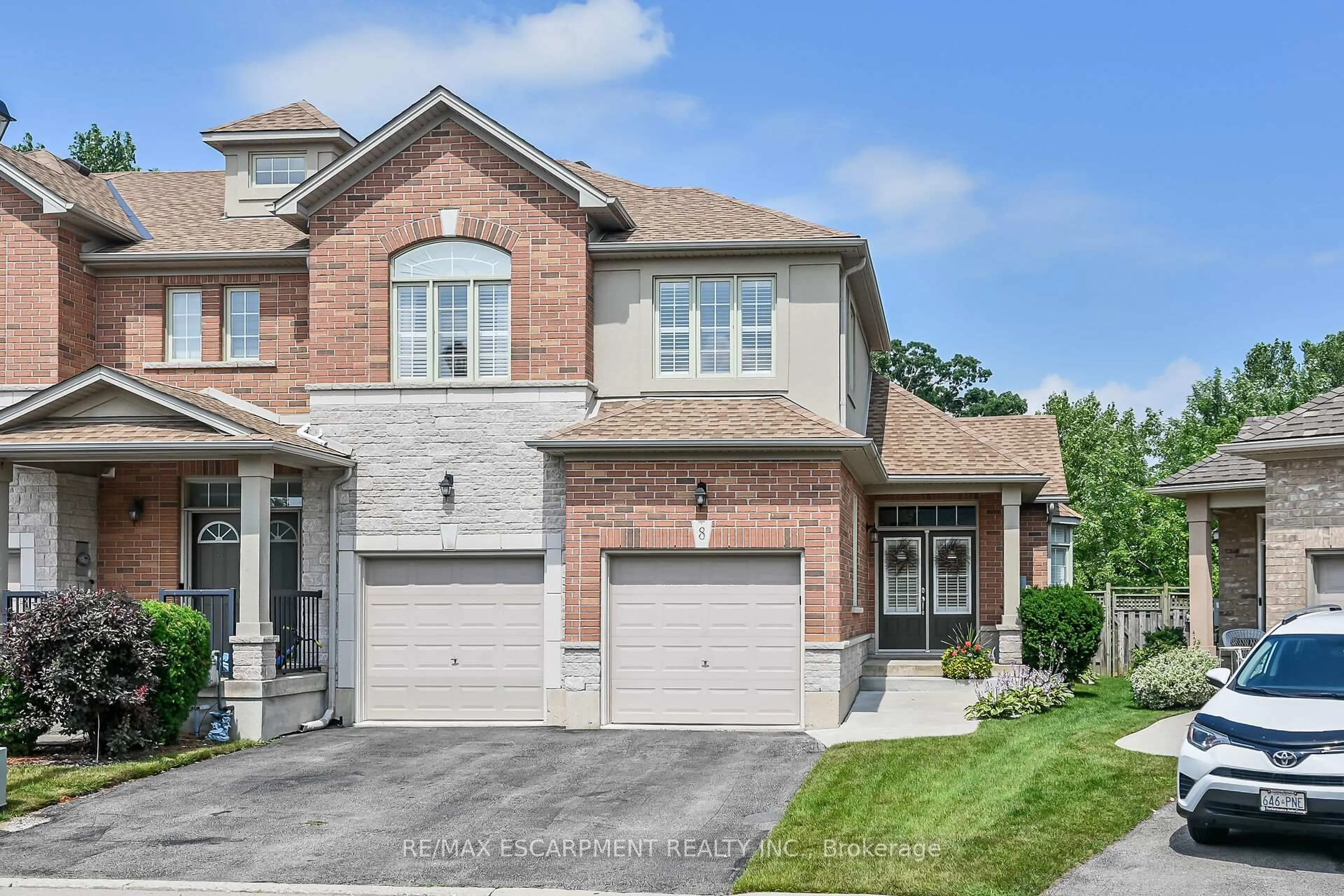 Home with brick exterior material, street for 99 Panabaker Dr #8, Hamilton Ontario L9G 0A3