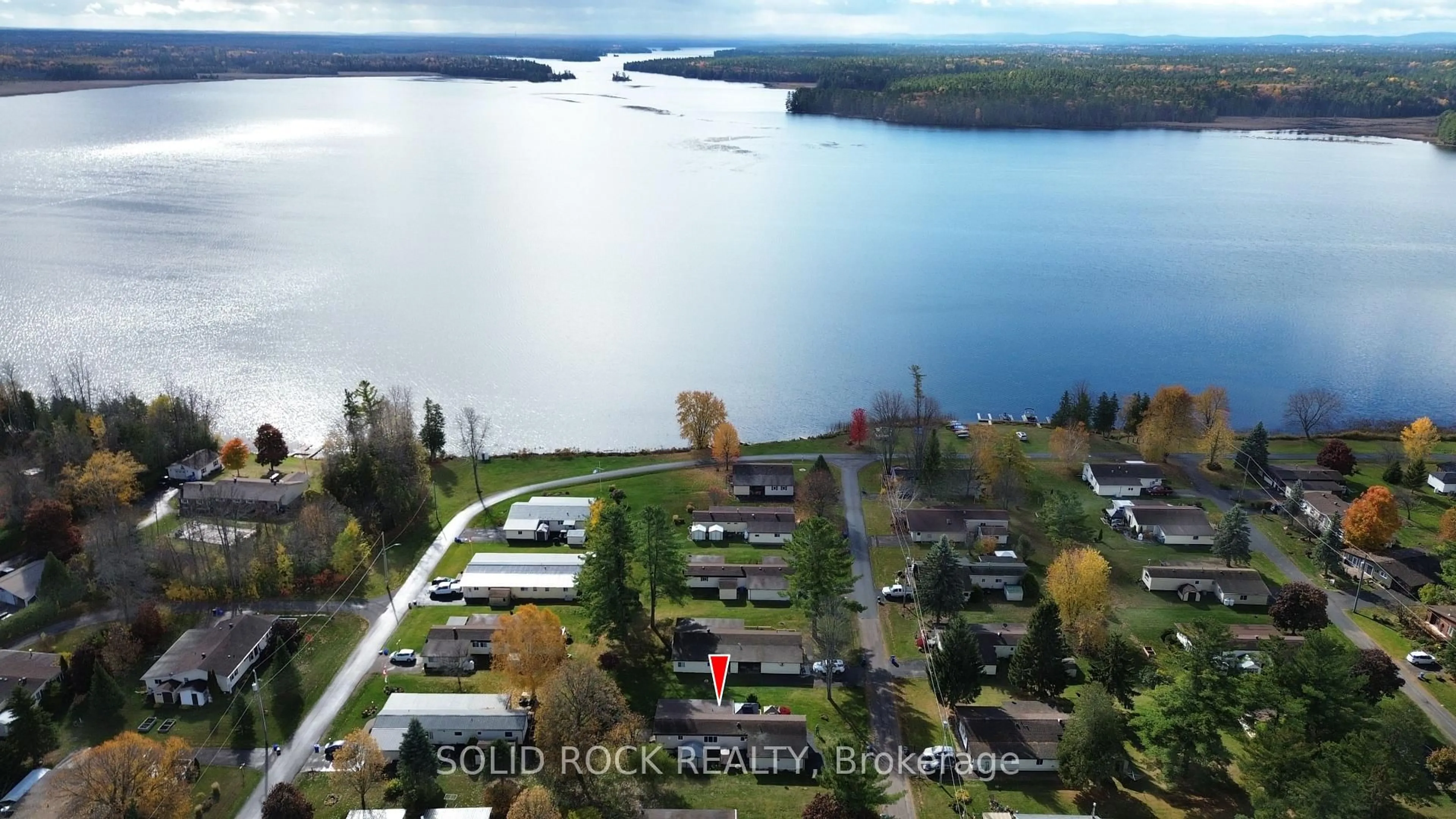 A pic from outside/outdoor area/front of a property/back of a property/a pic from drone, water/lake/river/ocean view for 26 Evergreen Lane, White Lake Ontario K0A 3L0