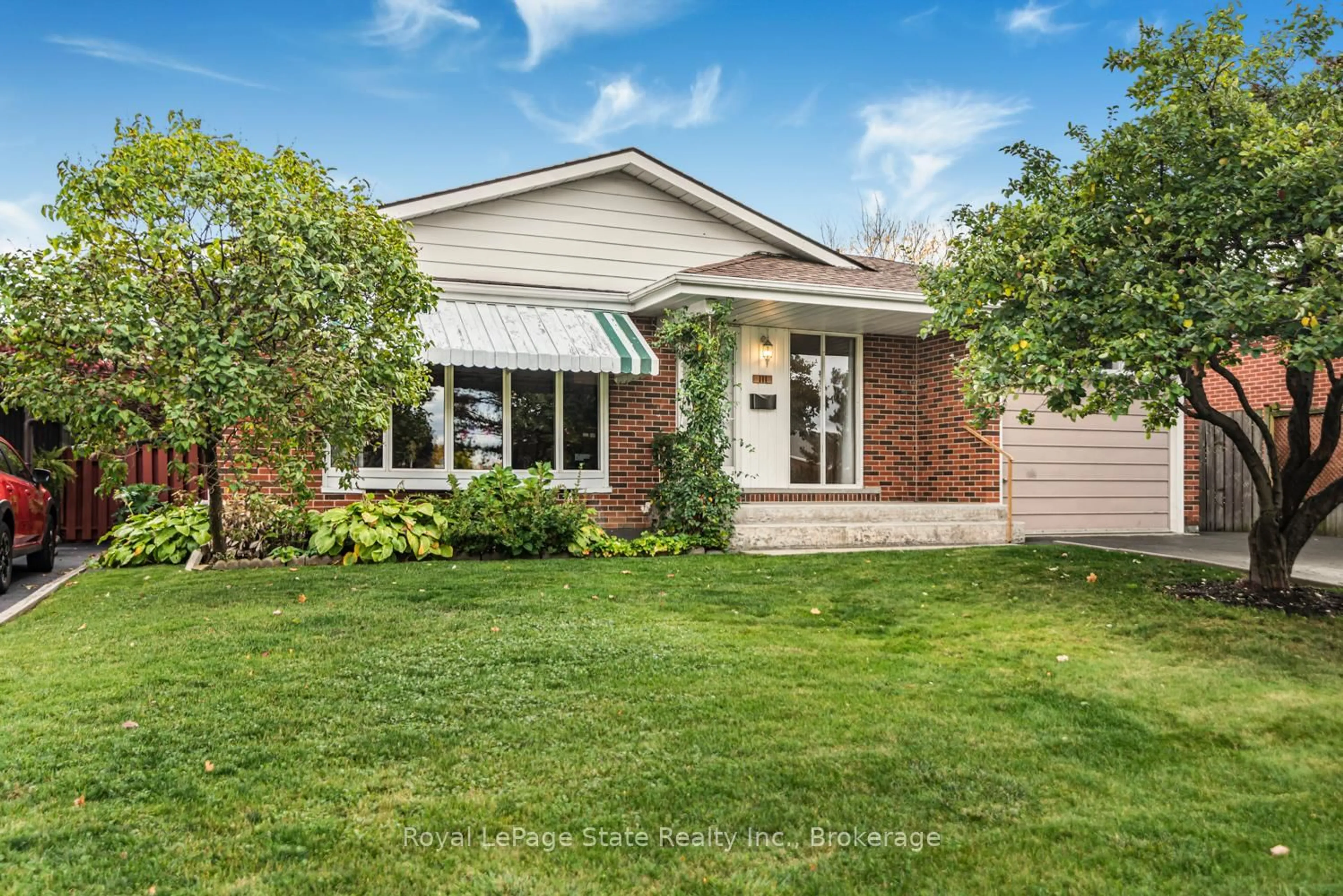 Home with brick exterior material, street for 111 Greenford Dr, Hamilton Ontario L8G 2G7