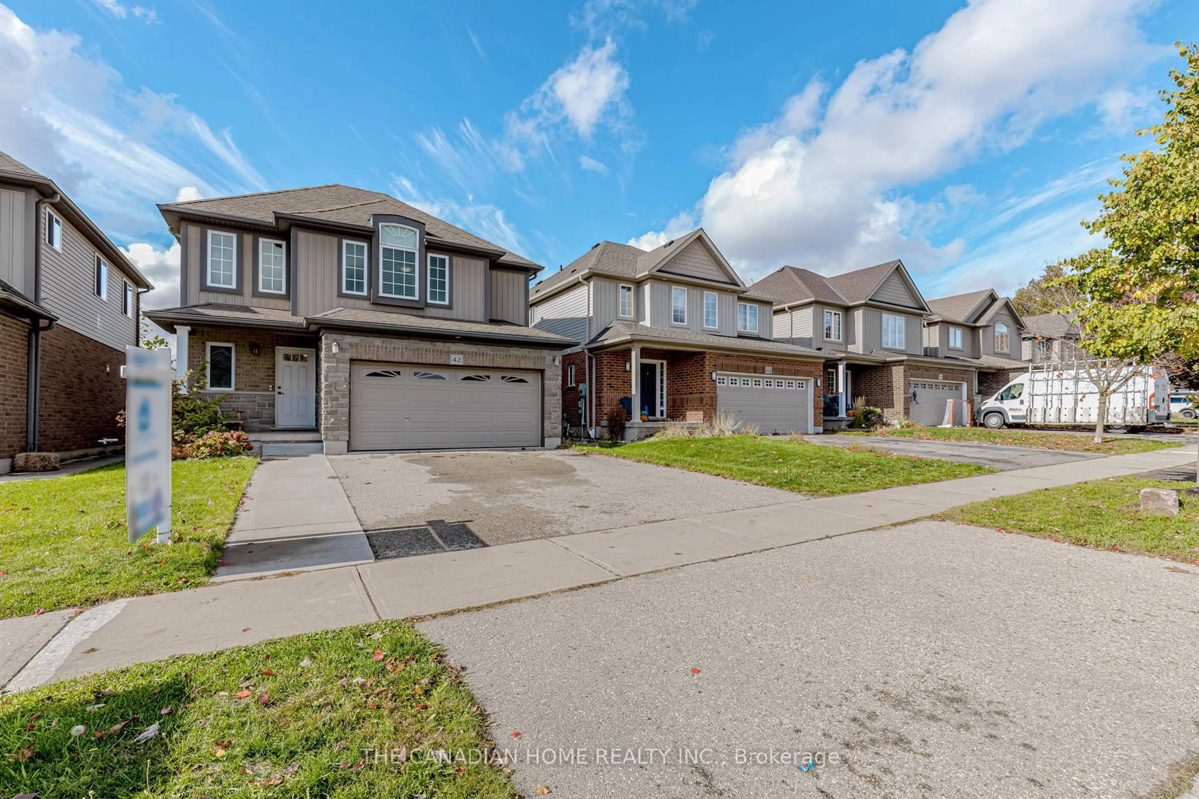 A pic from outside/outdoor area/front of a property/back of a property/a pic from drone, street for 42 Robert Simone Way, North Dumfries Ontario N0B 1E0