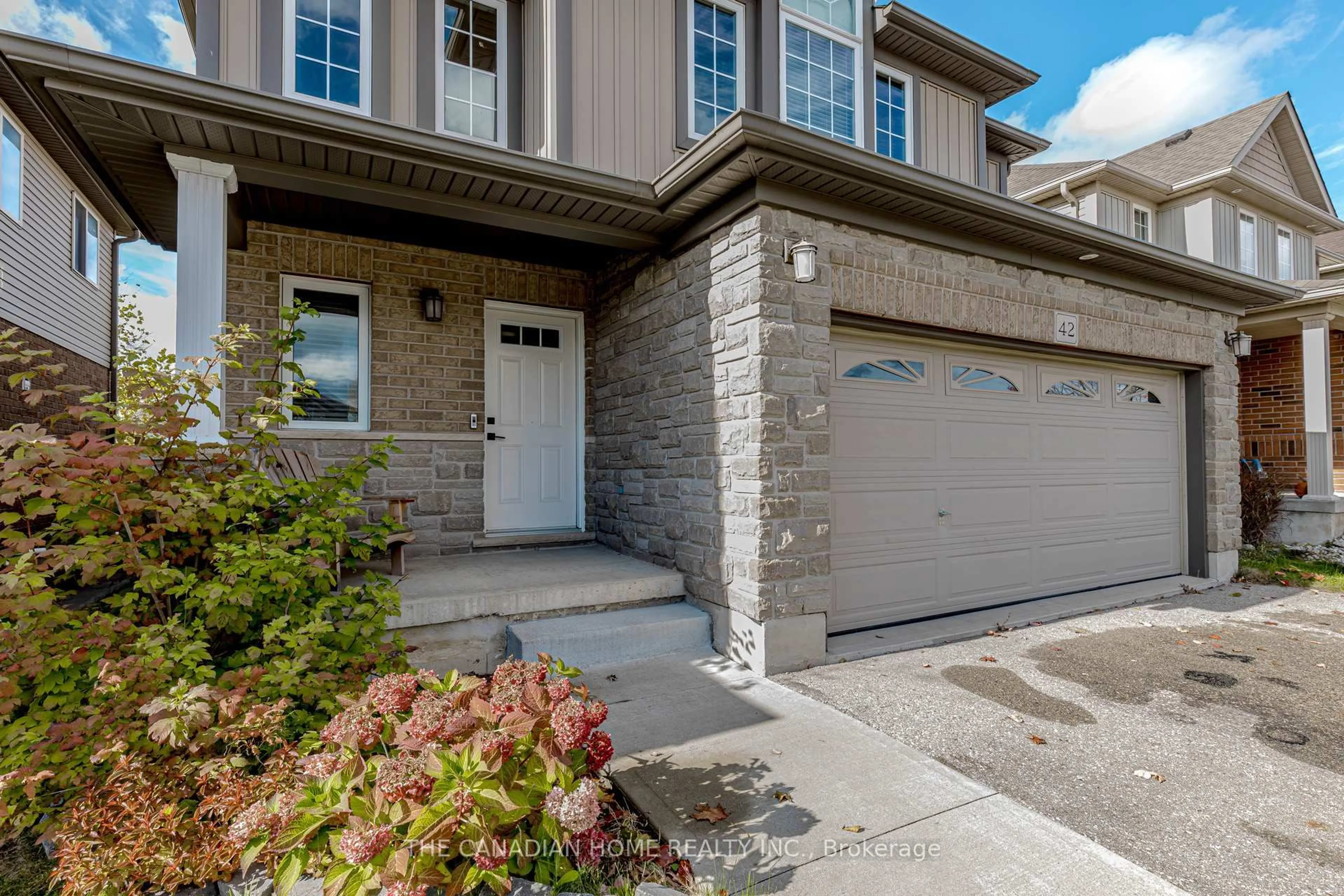 Home with brick exterior material, street for 42 Robert Simone Way, North Dumfries Ontario N0B 1E0