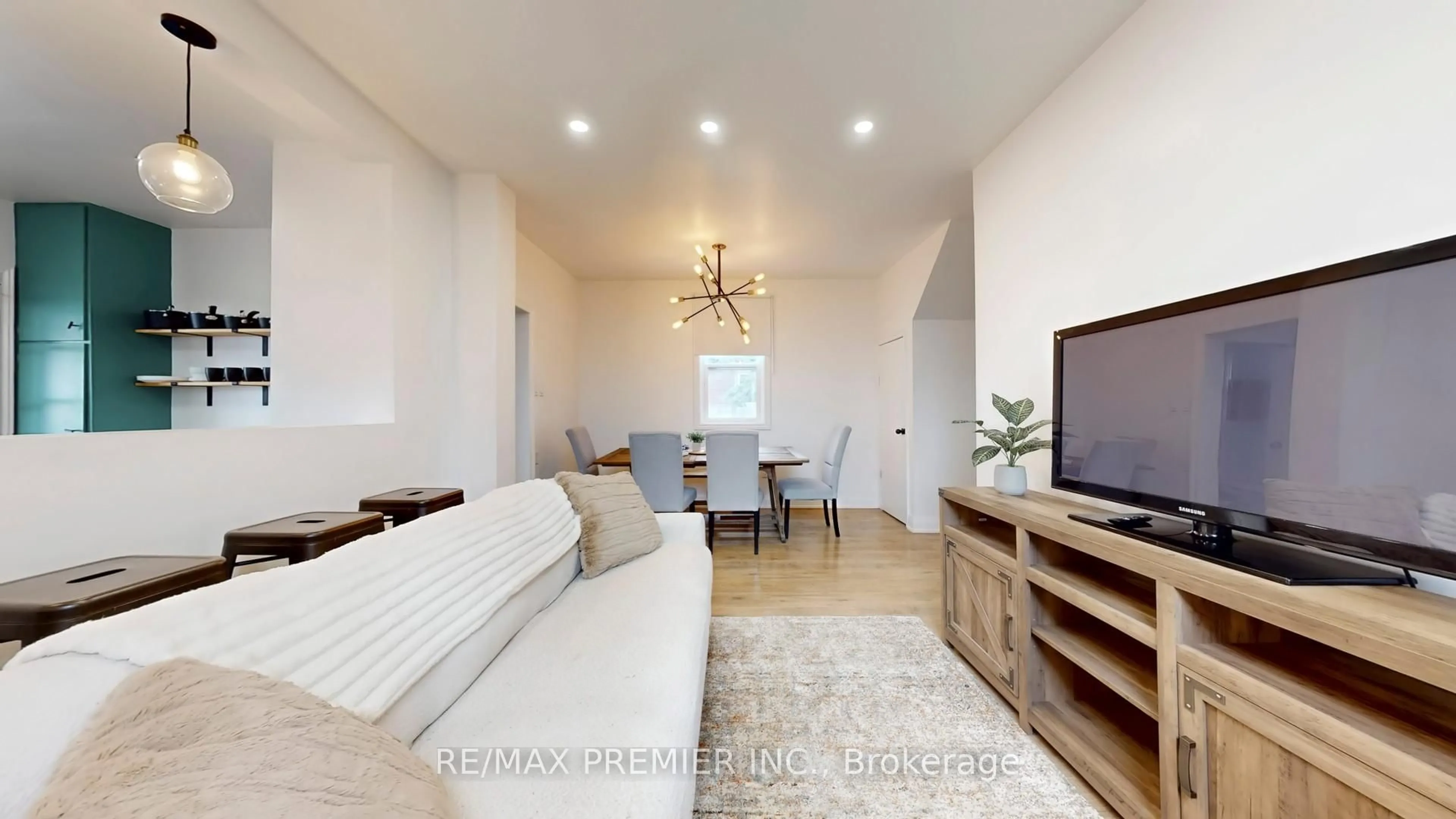 Living room with furniture, wood/laminate floor for 1 Burness Dr, St. Catharines Ontario L2P 1J2