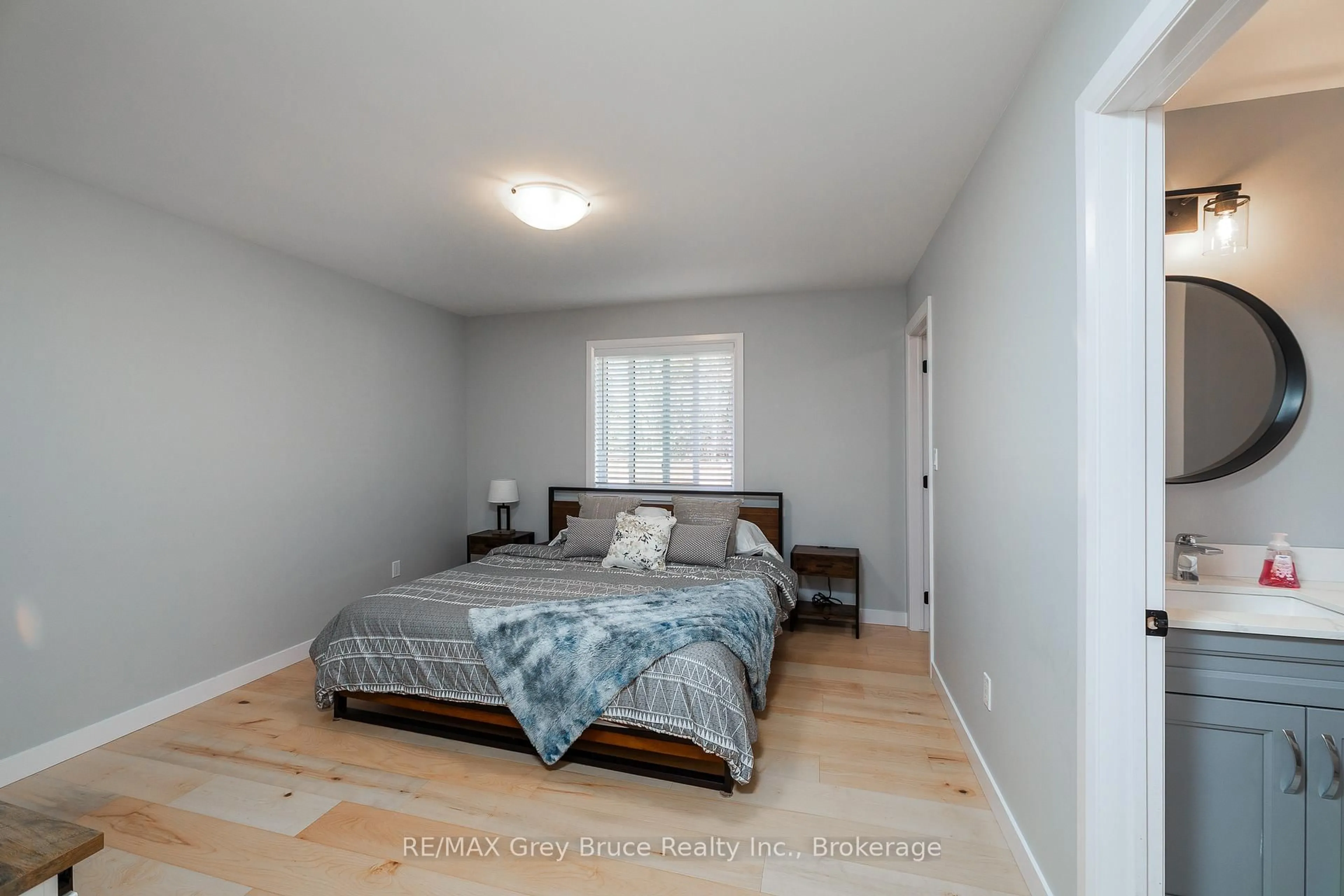 Bedroom with bed, wood/laminate floor for 611 Sixth St, South Bruce Peninsula Ontario N0H 2G0