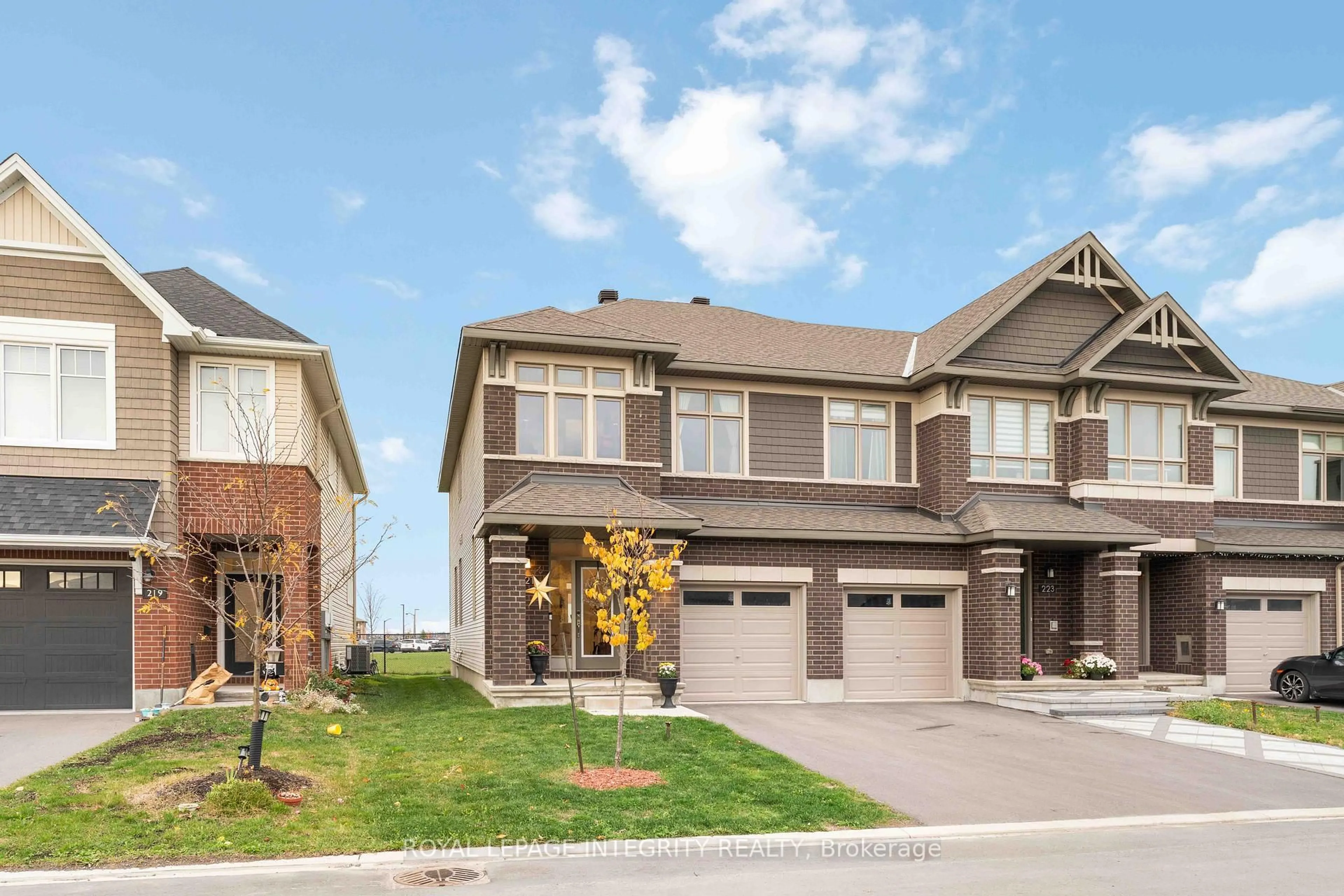 Home with brick exterior material, street for 221 Finsbury Ave, Ottawa Ontario K2S 2X9