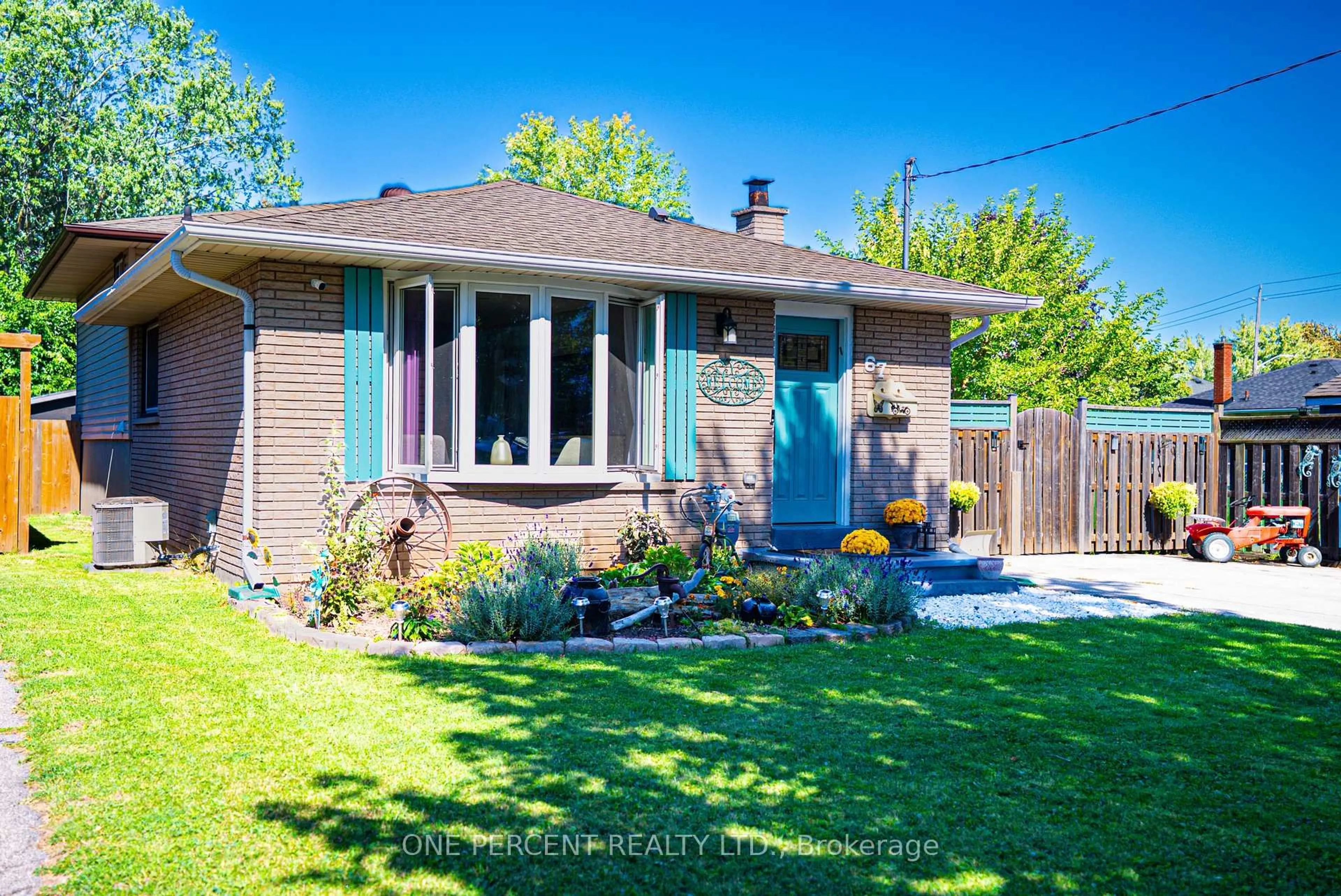 Home with brick exterior material, street for 67 Louis Ave, St. Catharines Ontario L2M 2N4