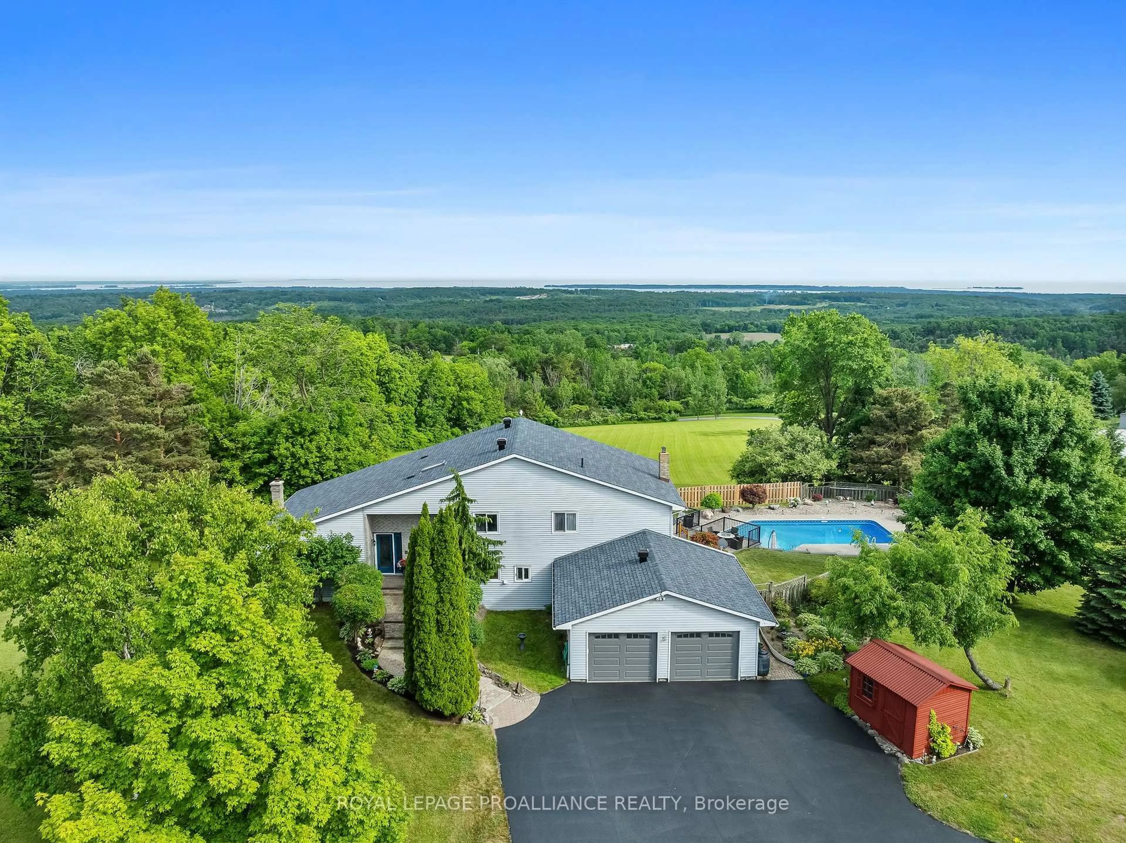 A pic from outside/outdoor area/front of a property/back of a property/a pic from drone, water/lake/river/ocean view for 748 County Rd 26, Brighton Ontario K0K 1H0