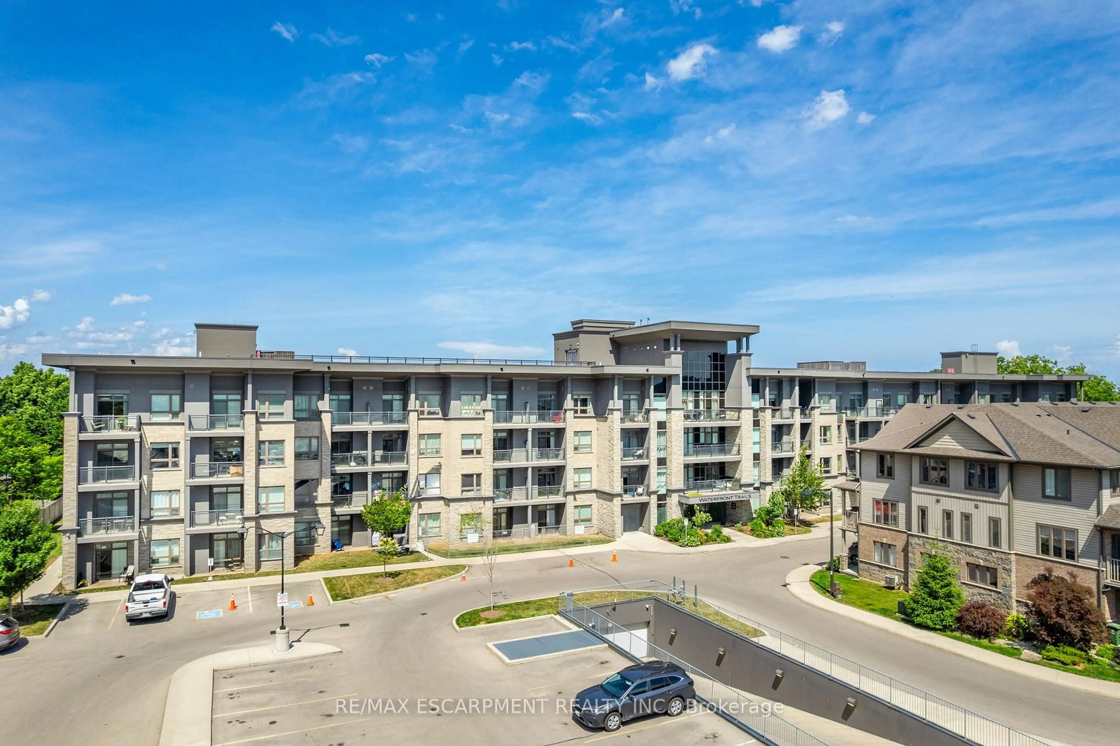 A pic from outside/outdoor area/front of a property/back of a property/a pic from drone, city buildings view from balcony for 35 Southshore Cres #313, Hamilton Ontario L8E 0J2
