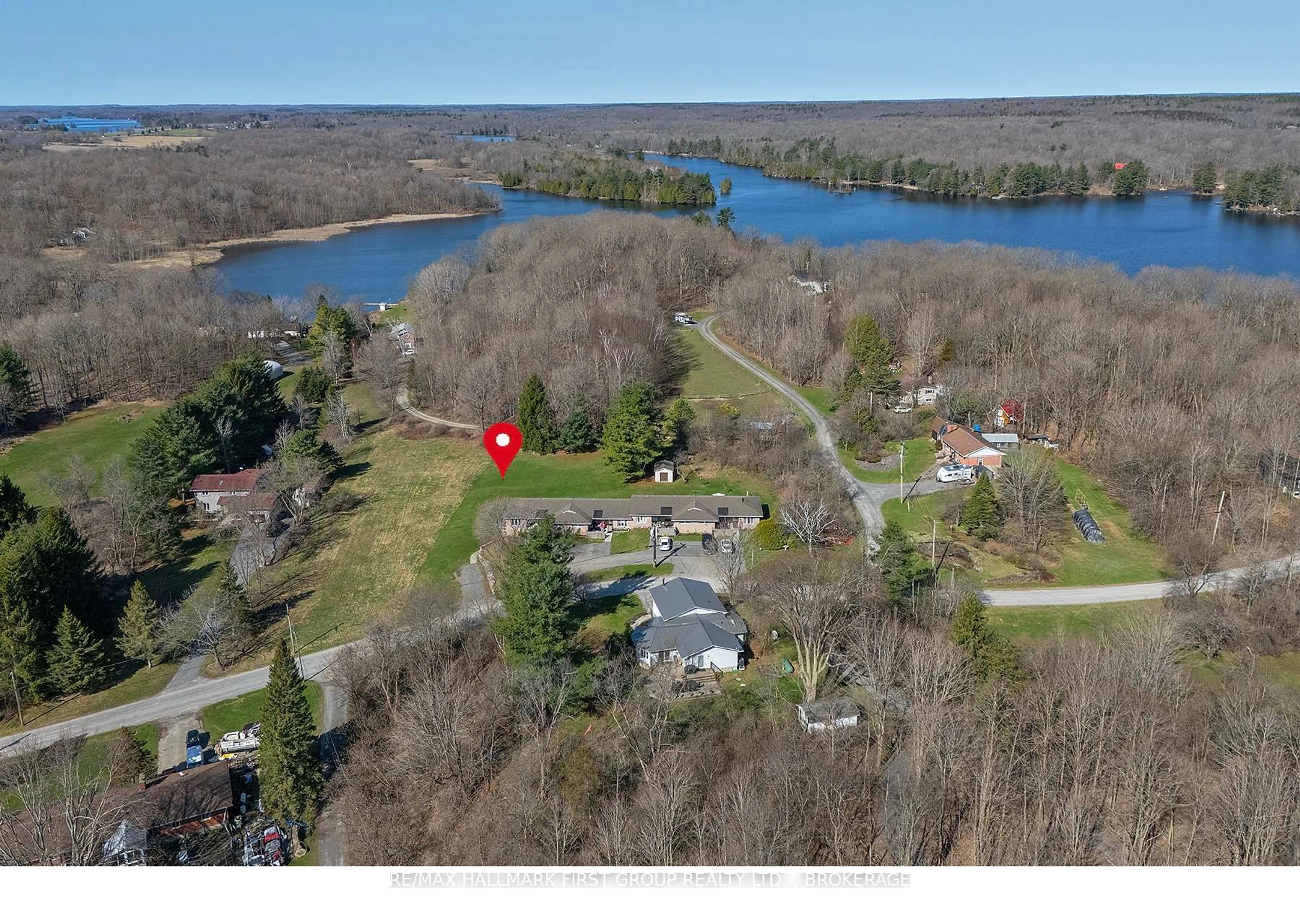 A pic from outside/outdoor area/front of a property/back of a property/a pic from drone, water/lake/river/ocean view for 128 Haskins Point Rd, Leeds and the Thousand Islands Ontario K0H 2N0