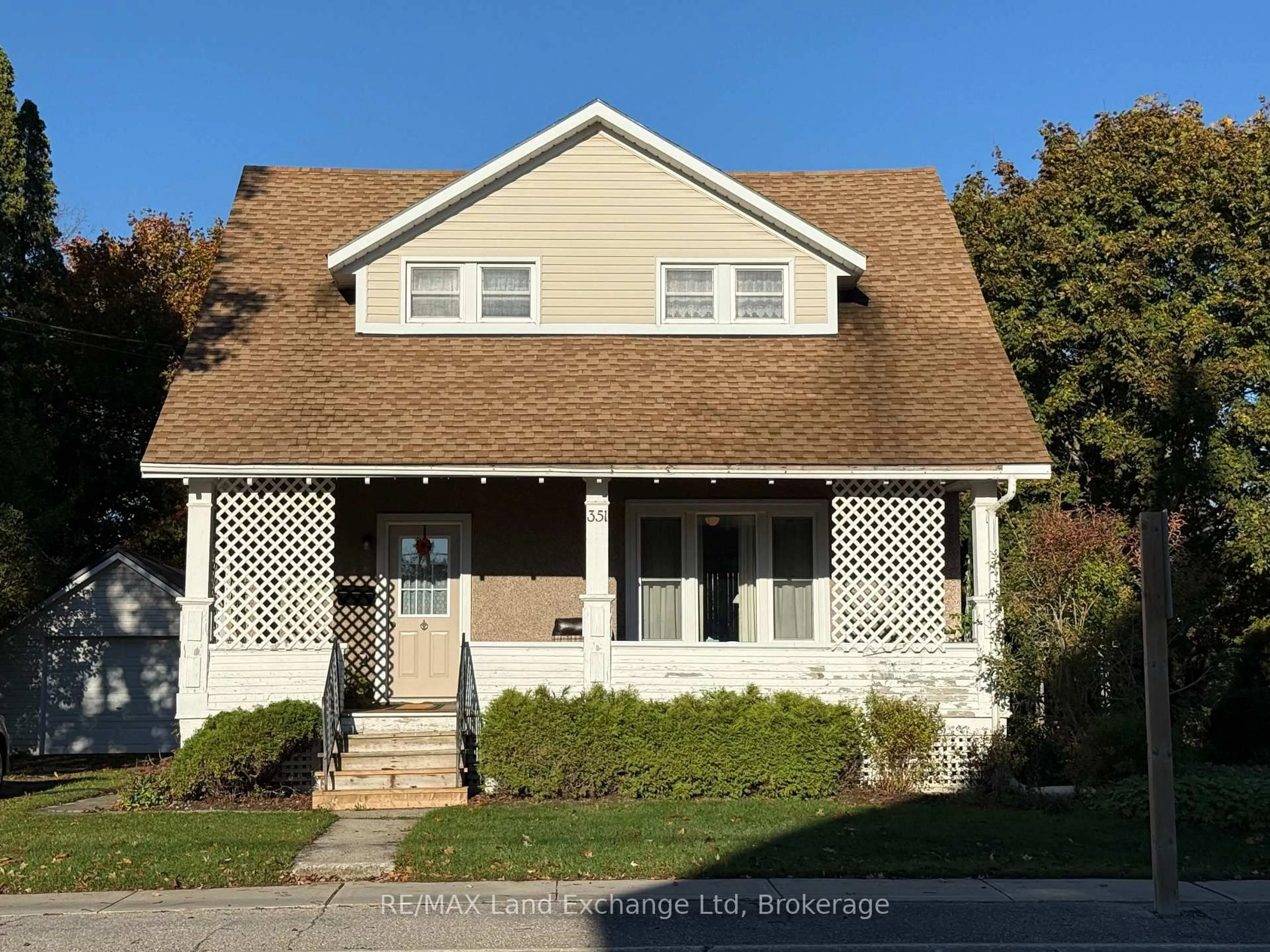 Home with vinyl exterior material, street for 351 Queen St, North Huron Ontario N0M 1H0