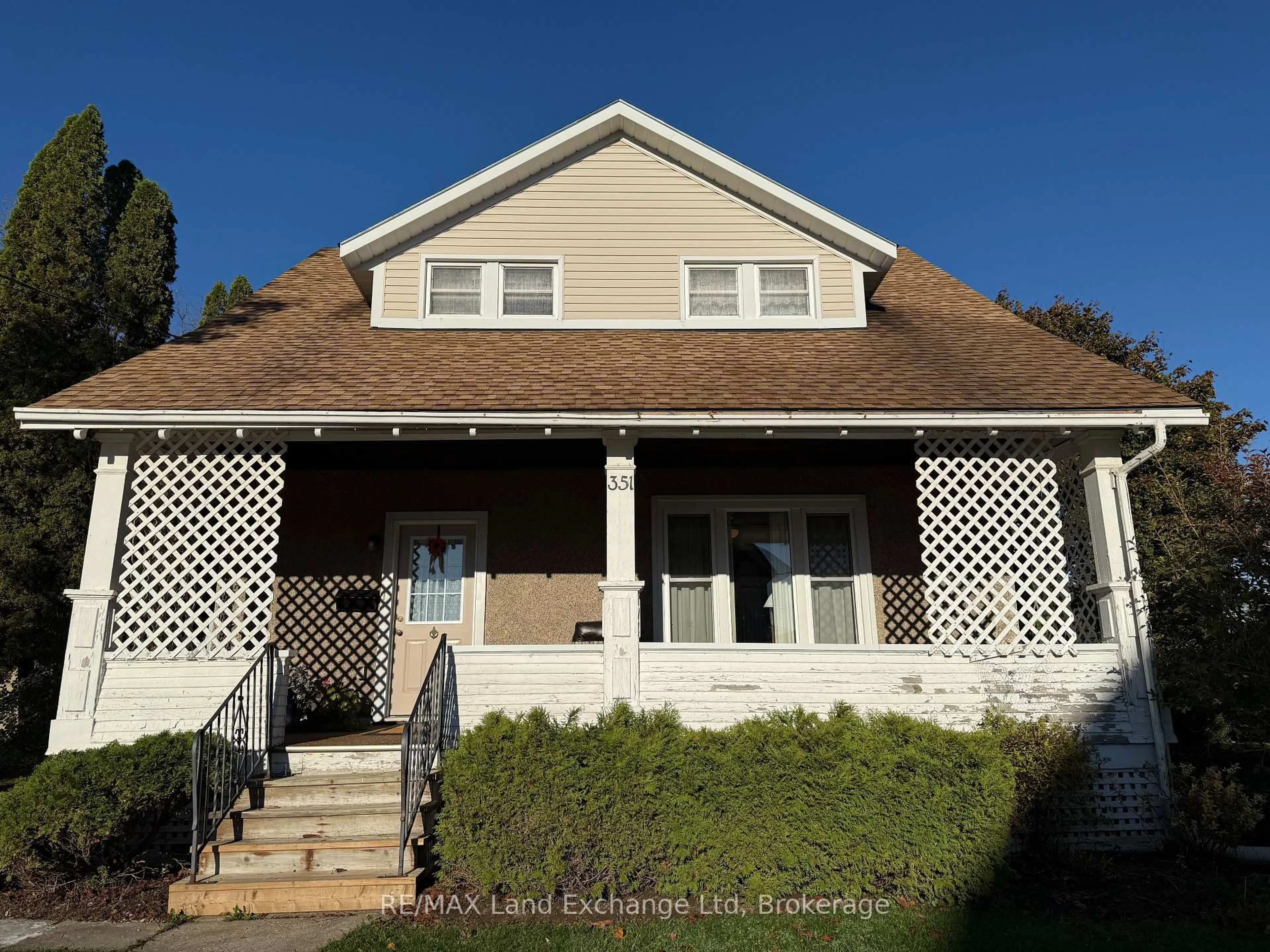 Home with vinyl exterior material, street for 351 Queen St, North Huron Ontario N0M 1H0