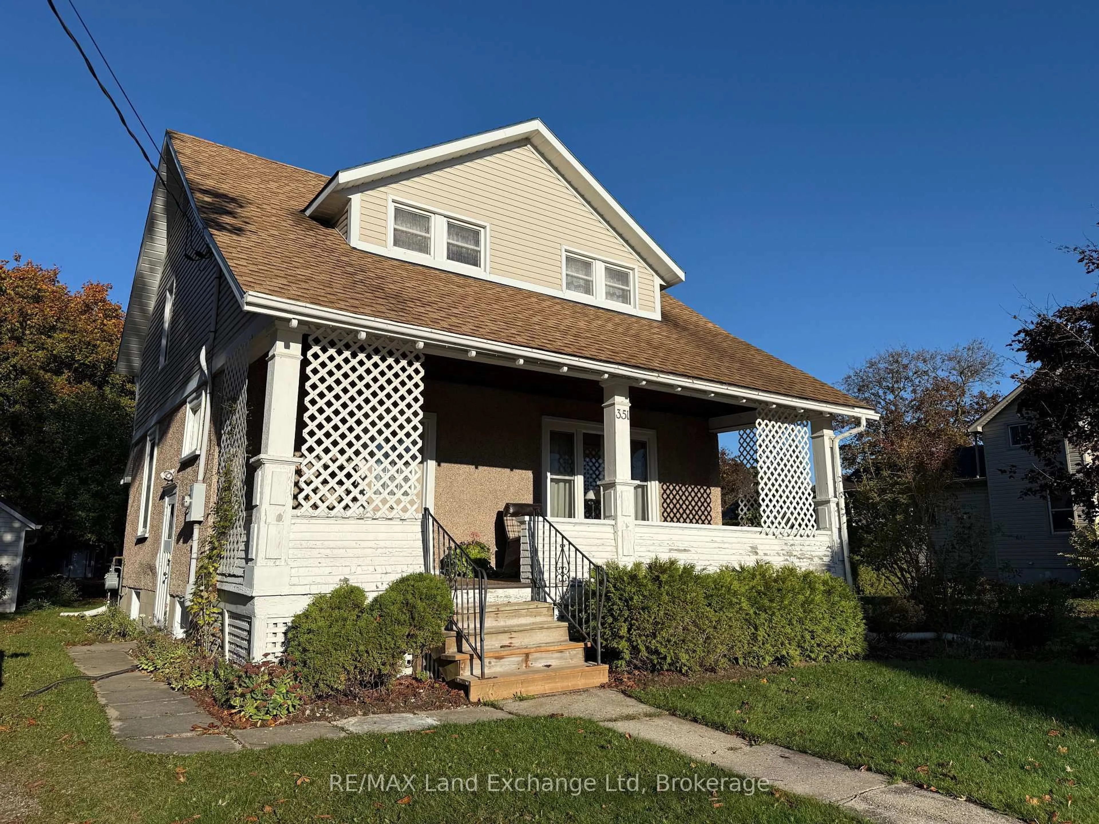 Home with vinyl exterior material, street for 351 Queen St, North Huron Ontario N0M 1H0