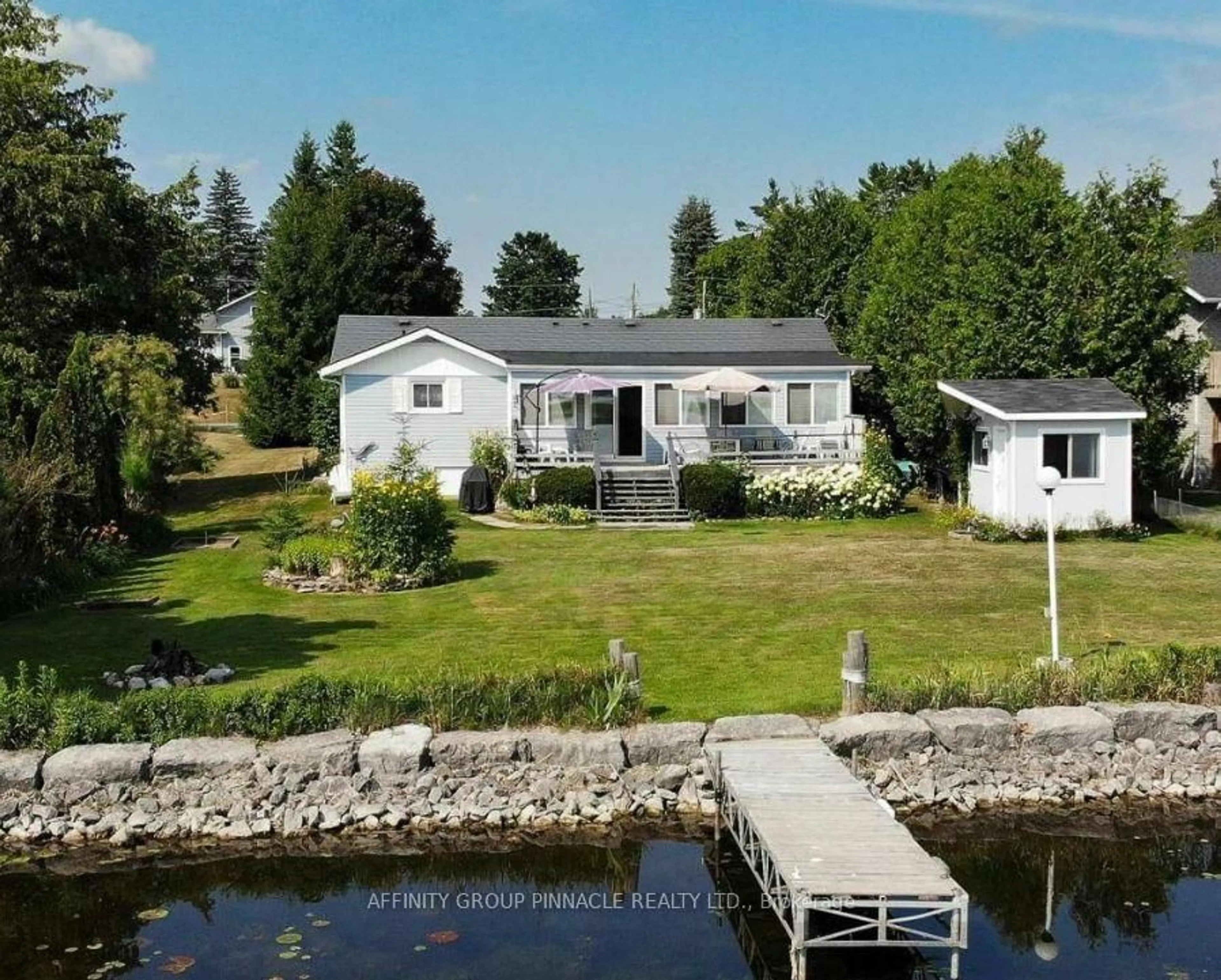 A pic from outside/outdoor area/front of a property/back of a property/a pic from drone, water/lake/river/ocean view for 11 Lakeview Cres, Kawartha Lakes Ontario K0M 1A0