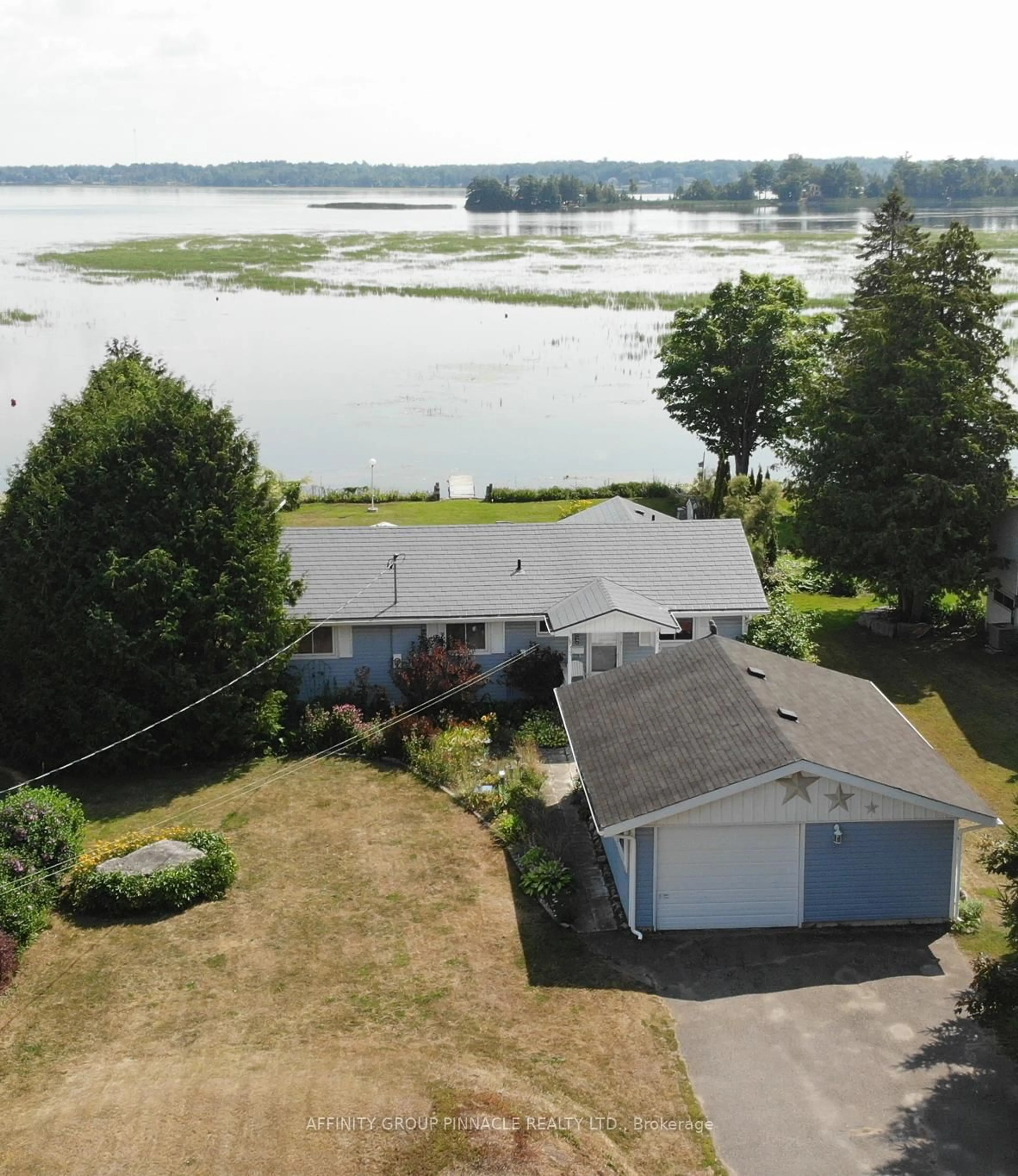 A pic from outside/outdoor area/front of a property/back of a property/a pic from drone, water/lake/river/ocean view for 11 Lakeview Cres, Kawartha Lakes Ontario K0M 1A0