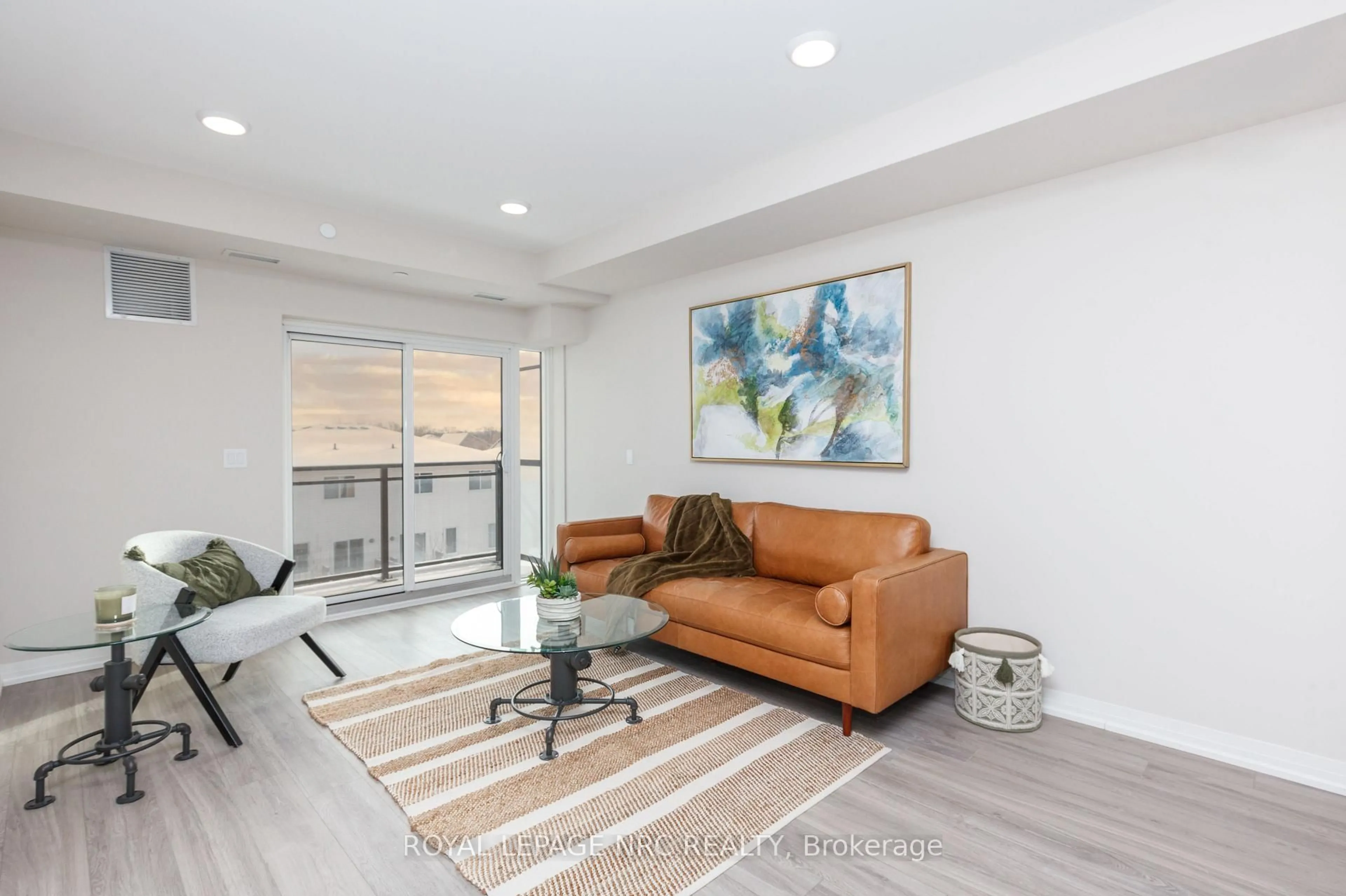 Living room with furniture, unknown for 50 HERRICK Ave #318, St. Catharines Ontario L2P 2T9