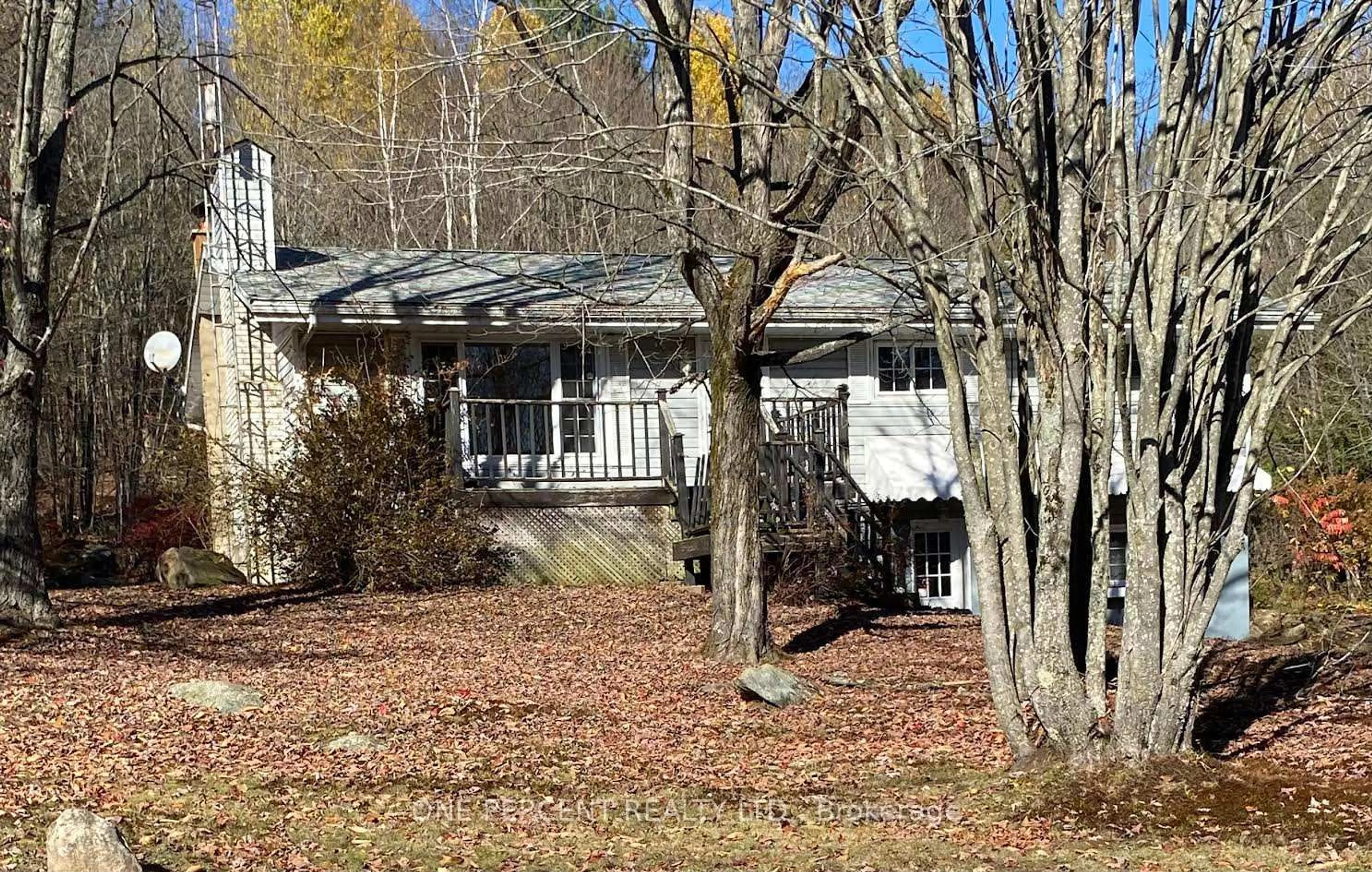 Home with vinyl exterior material, street for 42 Gun Club Rd, Huntsville Ontario P1H 2J2