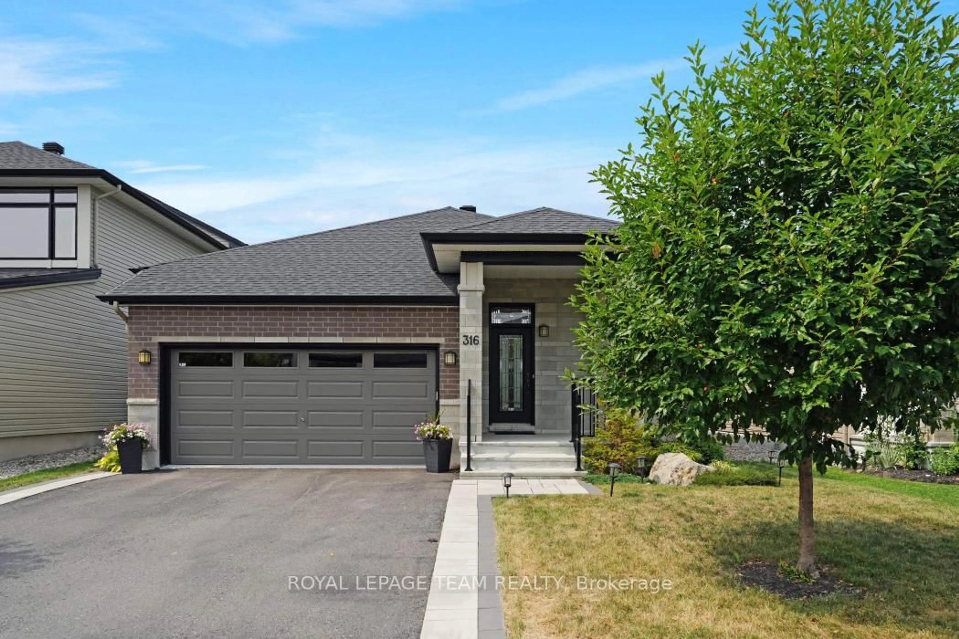 Home with brick exterior material, street for 316 Serenade Cres, Ottawa Ontario K1X 0B8