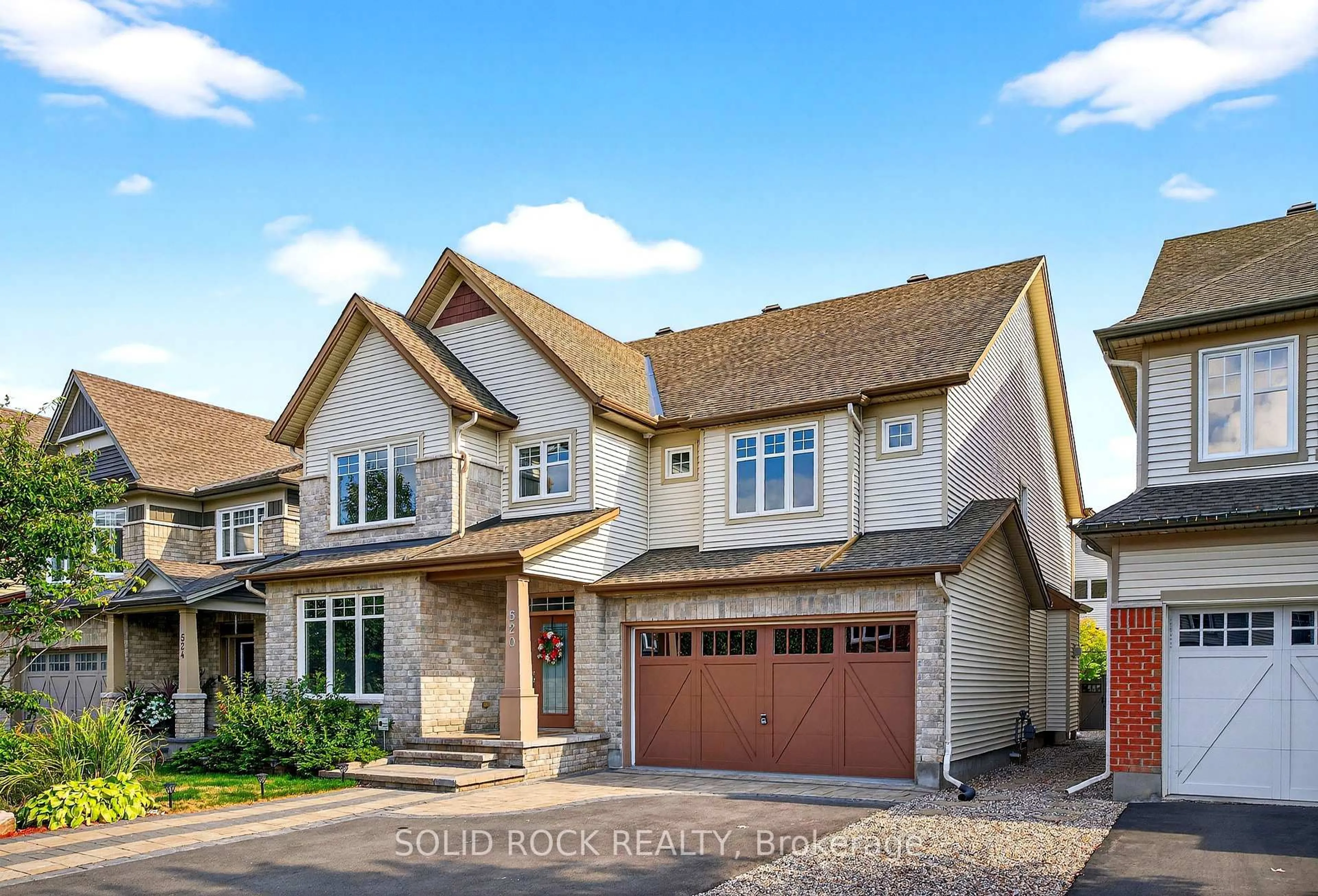 Home with brick exterior material, street for 520 Elm Park Ave, Ottawa Ontario K2J 5X9