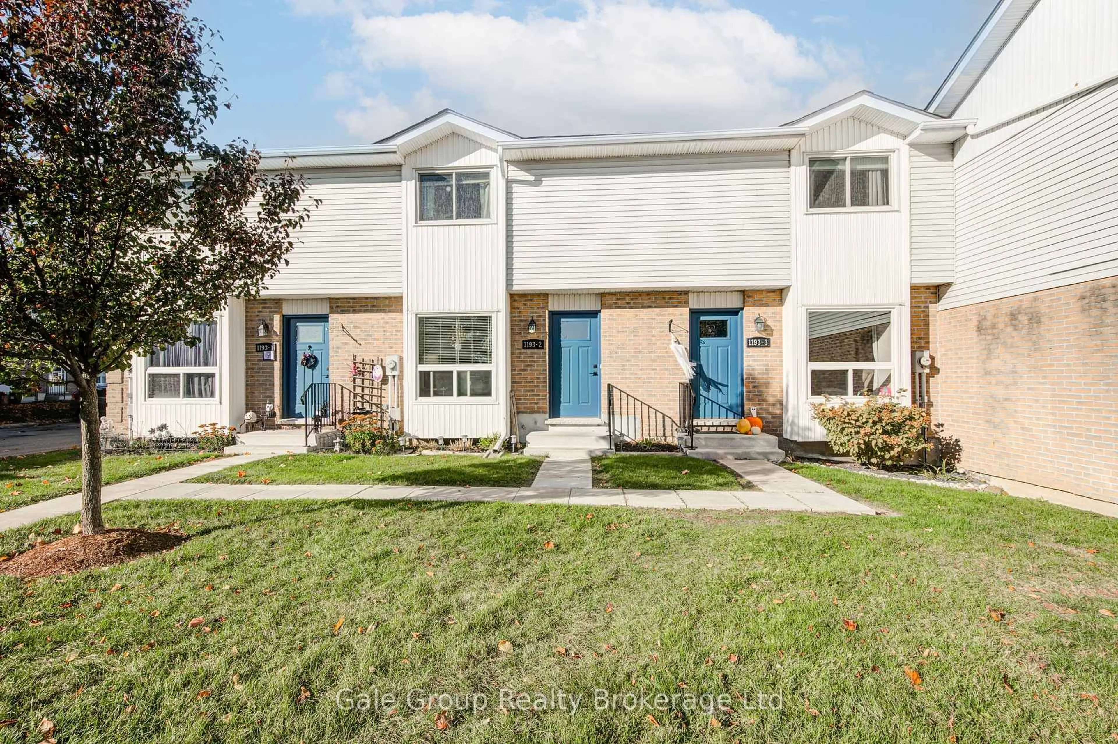 Home with vinyl exterior material, street for 1193 NELLIS St #2, Woodstock Ontario N4T 1N5