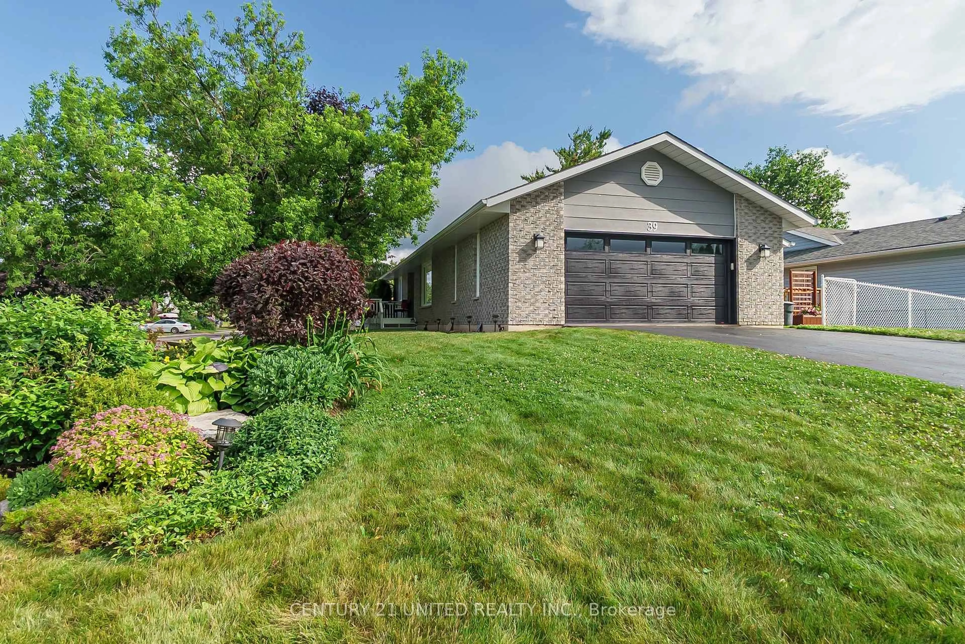 A pic from outside/outdoor area/front of a property/back of a property/a pic from drone, street for 39 Cedartree Lane, Kawartha Lakes Ontario K0M 1A0