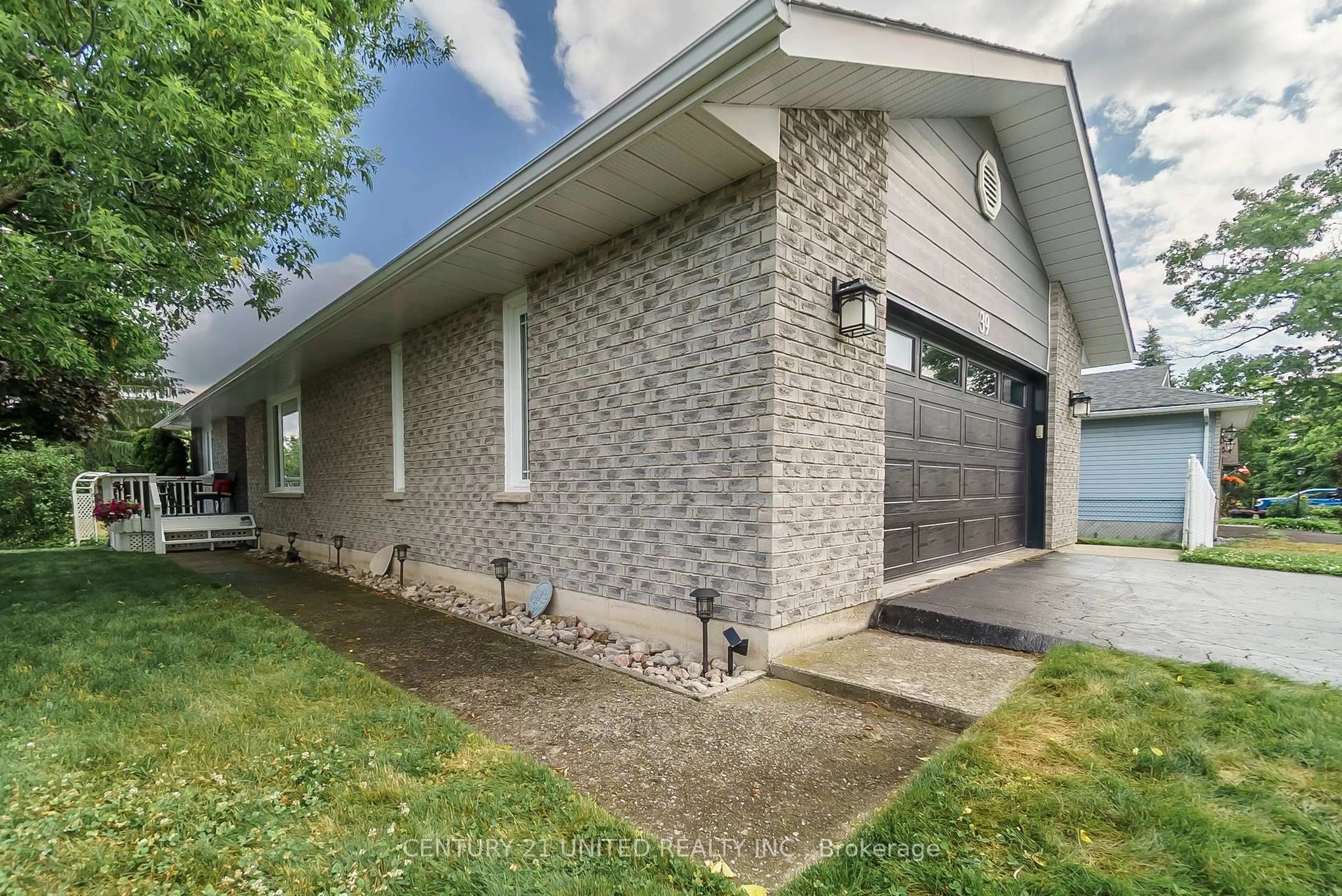 Home with brick exterior material, street for 39 Cedartree Lane, Kawartha Lakes Ontario K0M 1A0