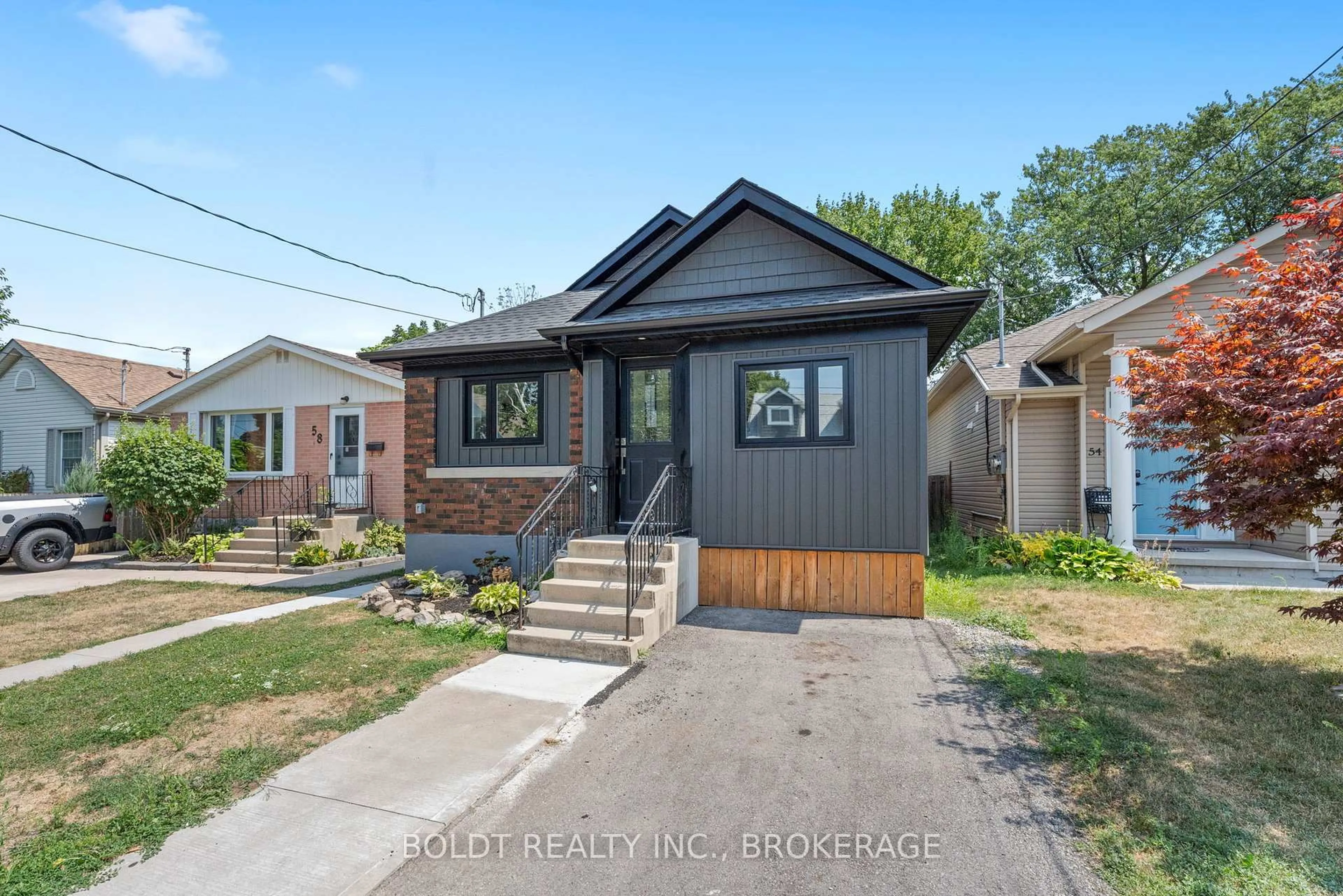 Home with brick exterior material, street for 56 Lorne St, St. Catharines Ontario L2P 3C4