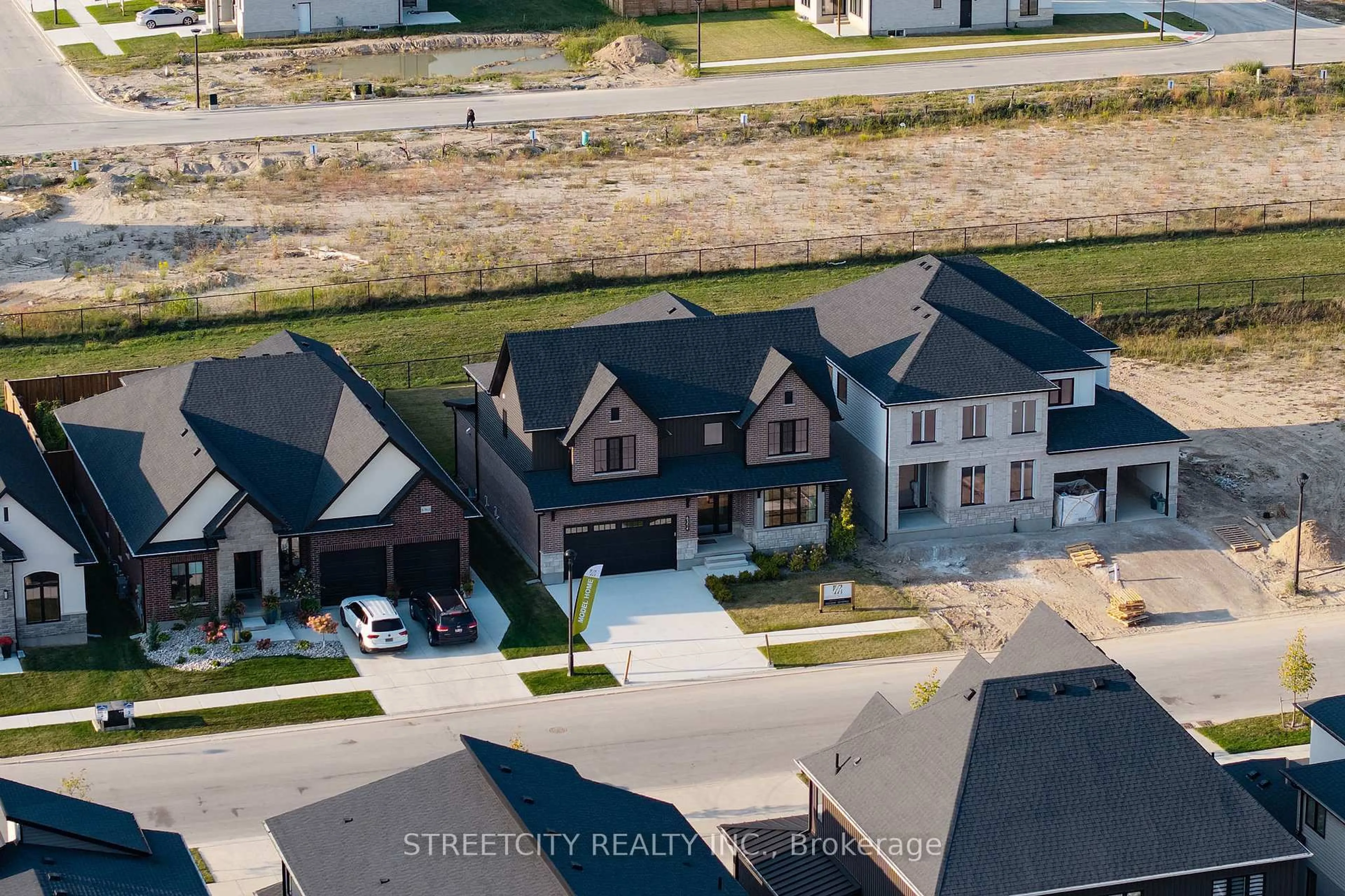 A pic from outside/outdoor area/front of a property/back of a property/a pic from drone, street for 6354 Old Garrison Blvd, London South Ontario N6P 0H3