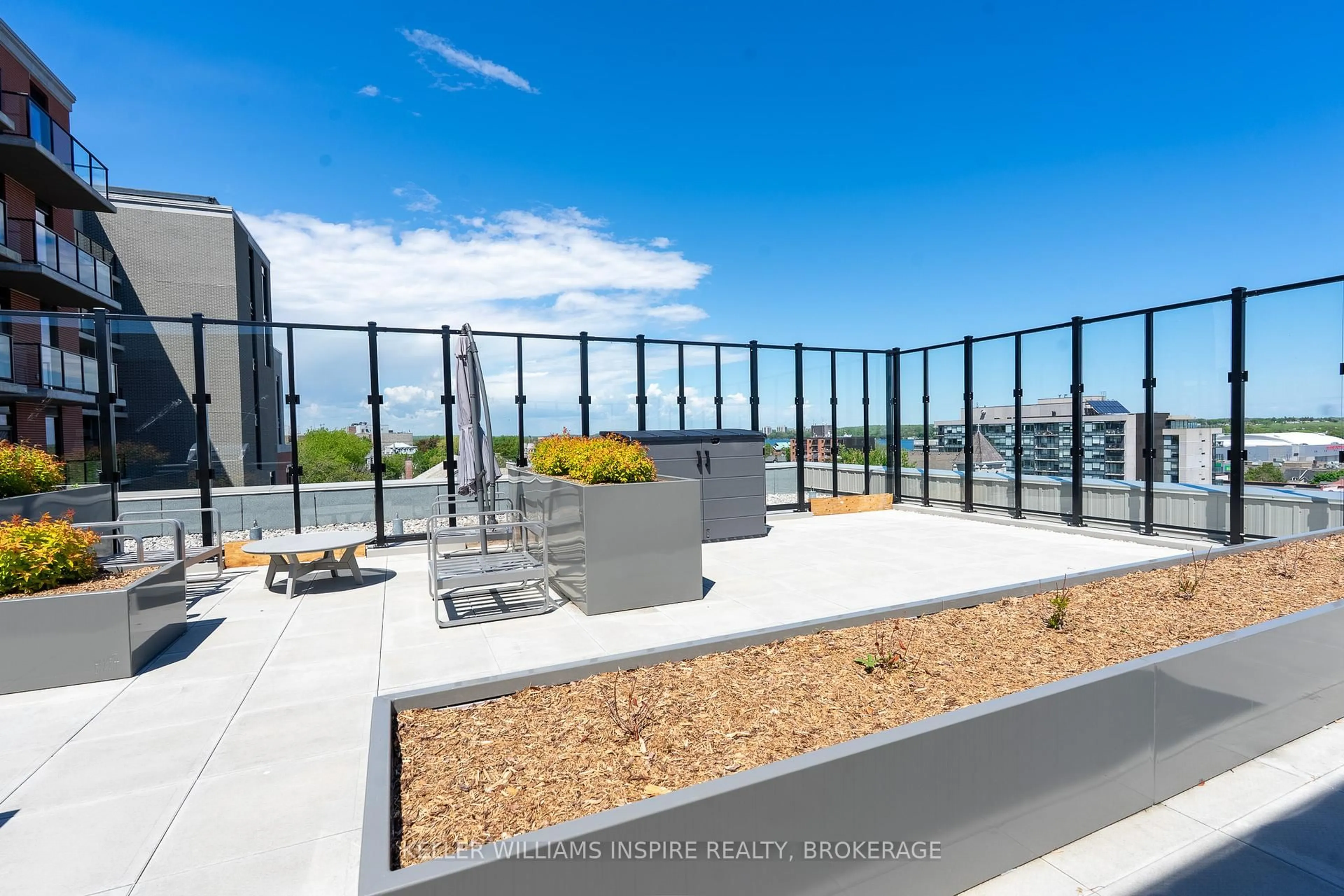 Patio, city buildings view from balcony for 223 Princess St #701, Kingston Ontario K7L 1B3