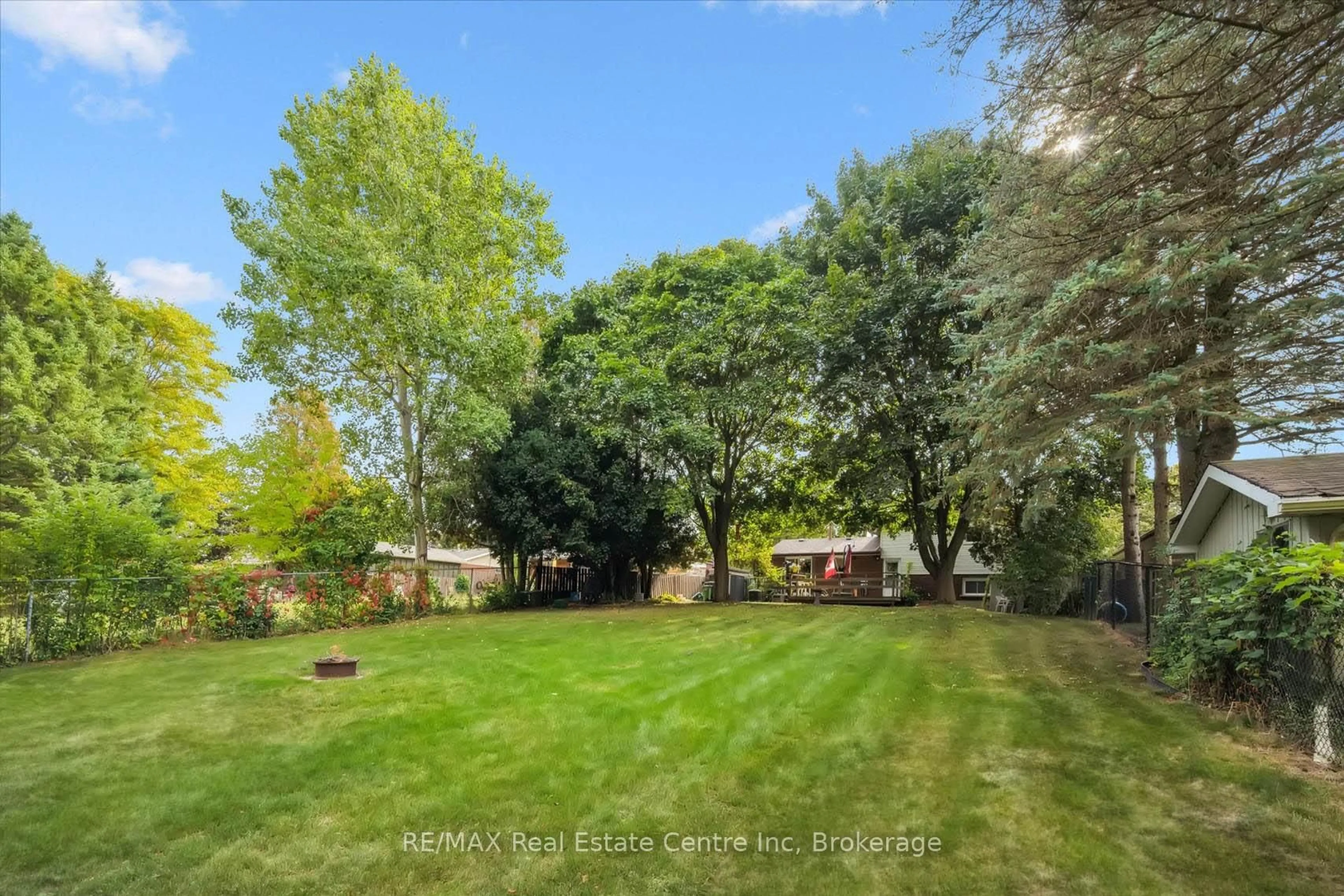 A pic from outside/outdoor area/front of a property/back of a property/a pic from drone, forest/trees view for 33 Hastings Blvd, Guelph Ontario N1E 4G3