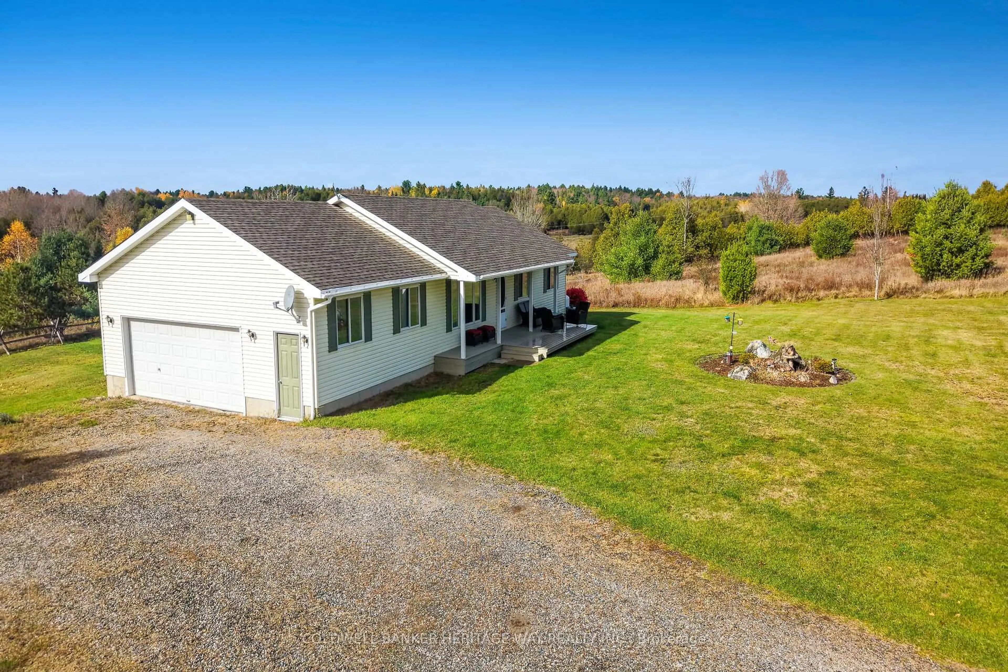 A pic from outside/outdoor area/front of a property/back of a property/a pic from drone, water/lake/river/ocean view for 1947 Rosetta Rd, Lanark Ontario K0G 1K0