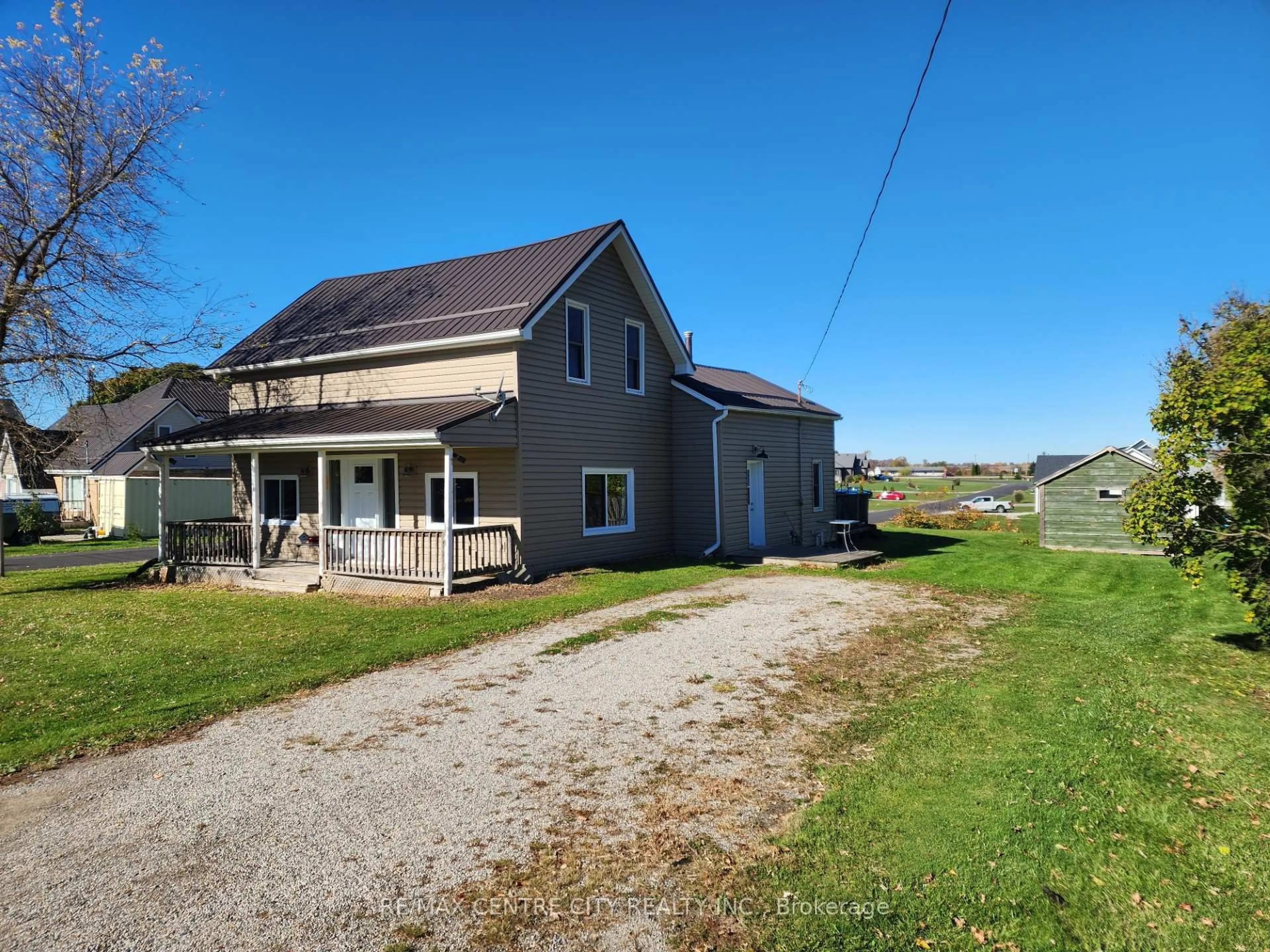 A pic from outside/outdoor area/front of a property/back of a property/a pic from drone, street for 33168 BACK St, Dutton/Dunwich Ontario N0L 1P0