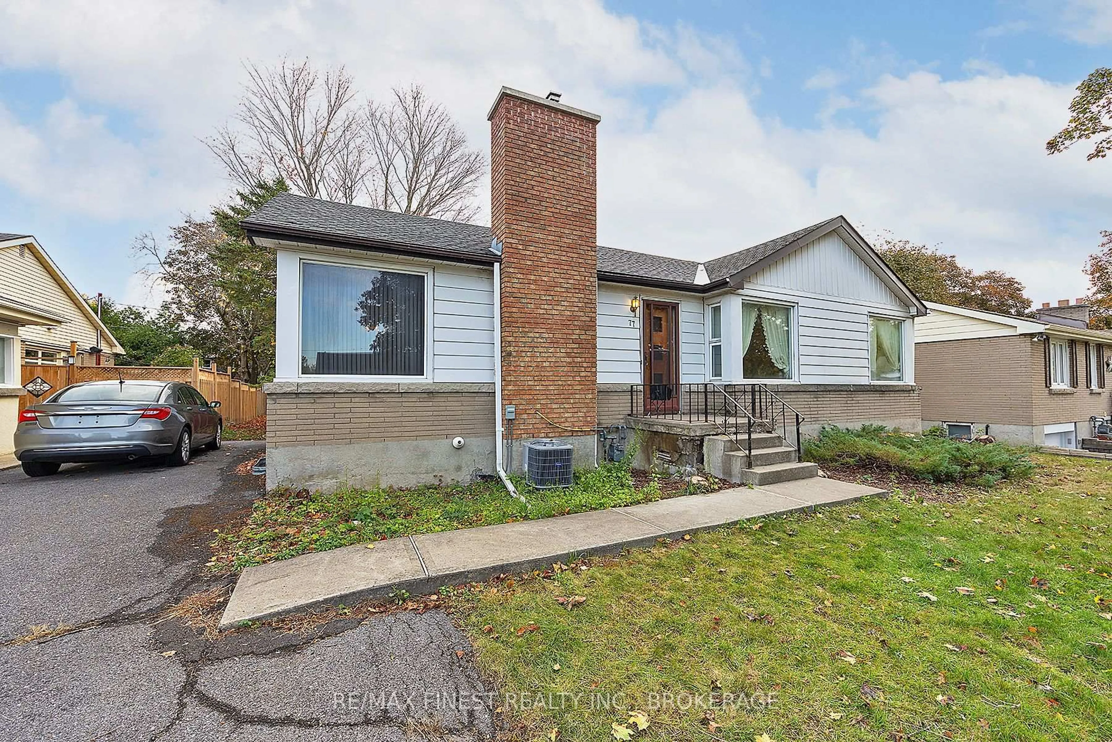 Home with brick exterior material, street for 77 Westmoreland Rd, Kingston Ontario K7M 1J6