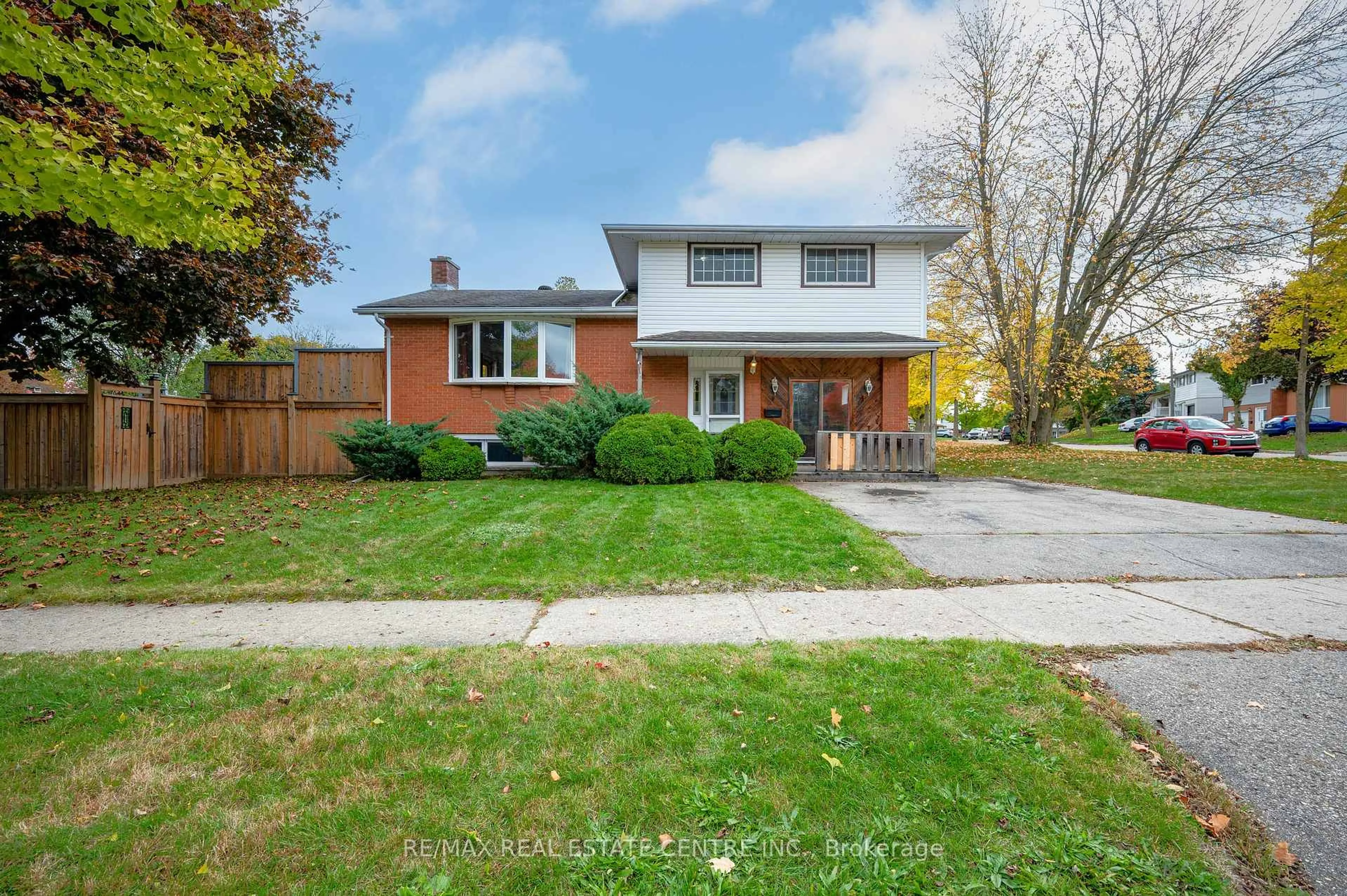 Home with brick exterior material, street for 18 Kingston Cres, Kitchener Ontario N2B 2T7