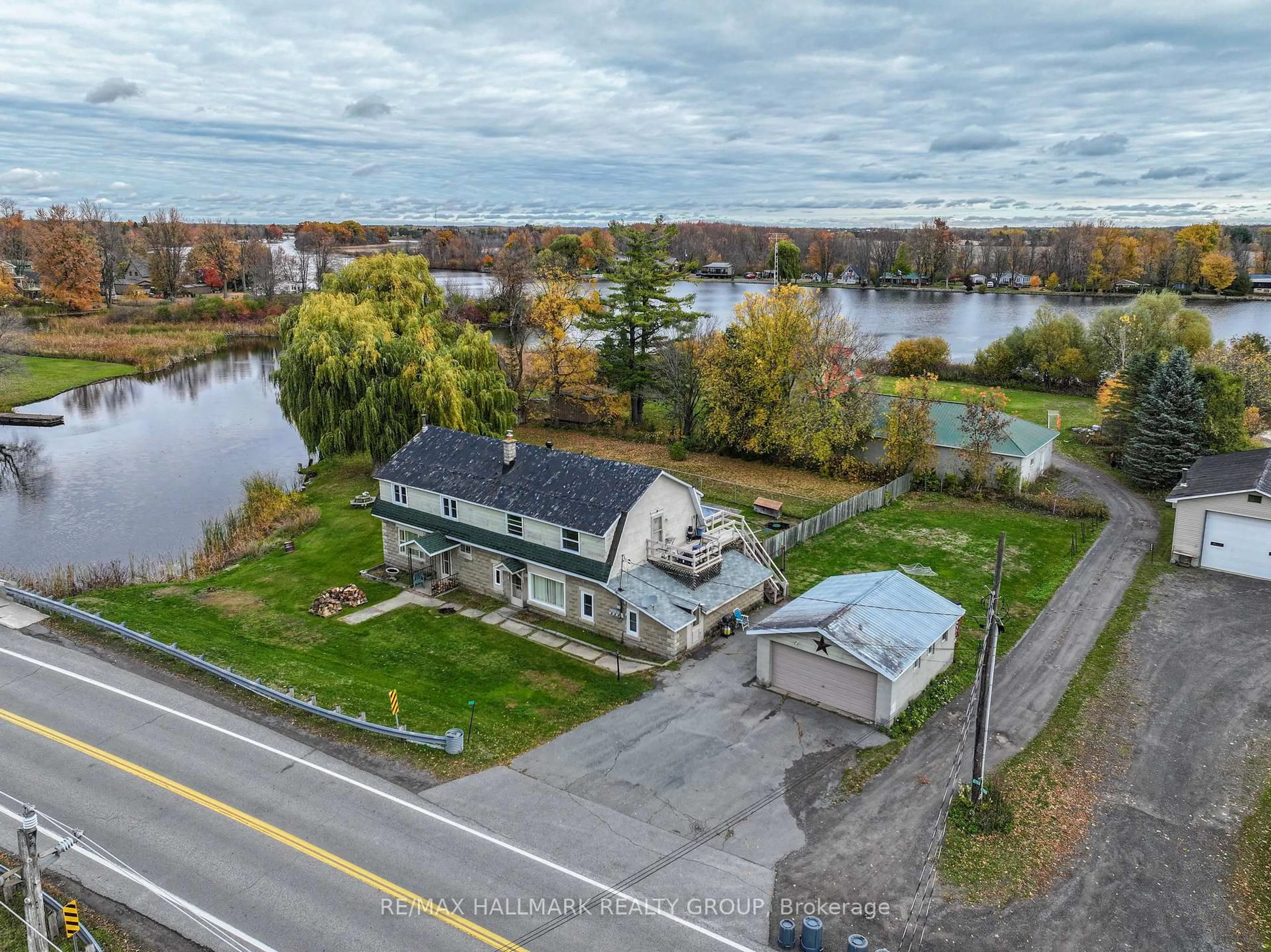 A pic from outside/outdoor area/front of a property/back of a property/a pic from drone, water/lake/river/ocean view for 6763 Rideau Valley Dr, Kars Ontario K0A 2E0