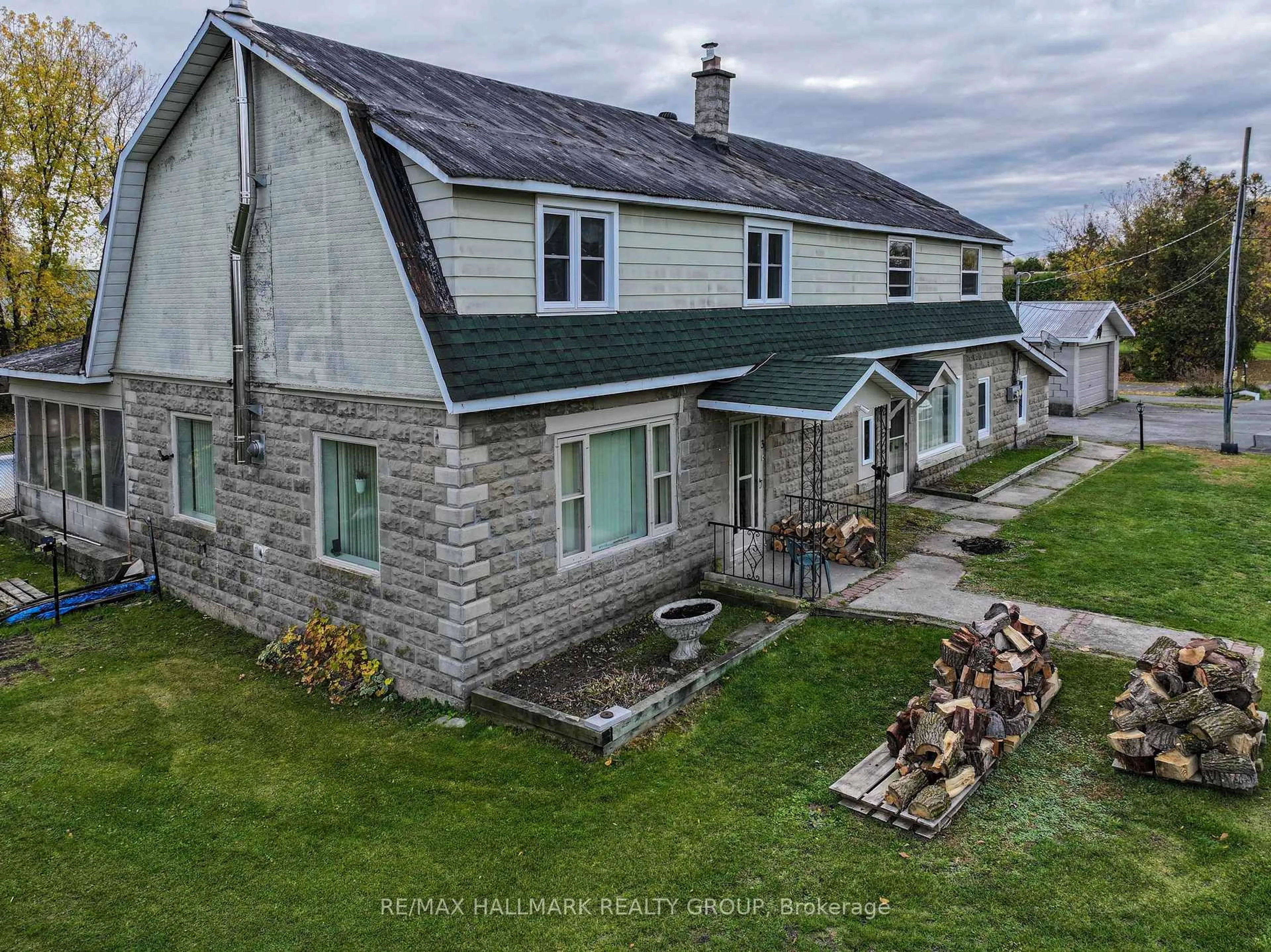 A pic from outside/outdoor area/front of a property/back of a property/a pic from drone, unknown for 6763 Rideau Valley Dr, Kars Ontario K0A 2E0