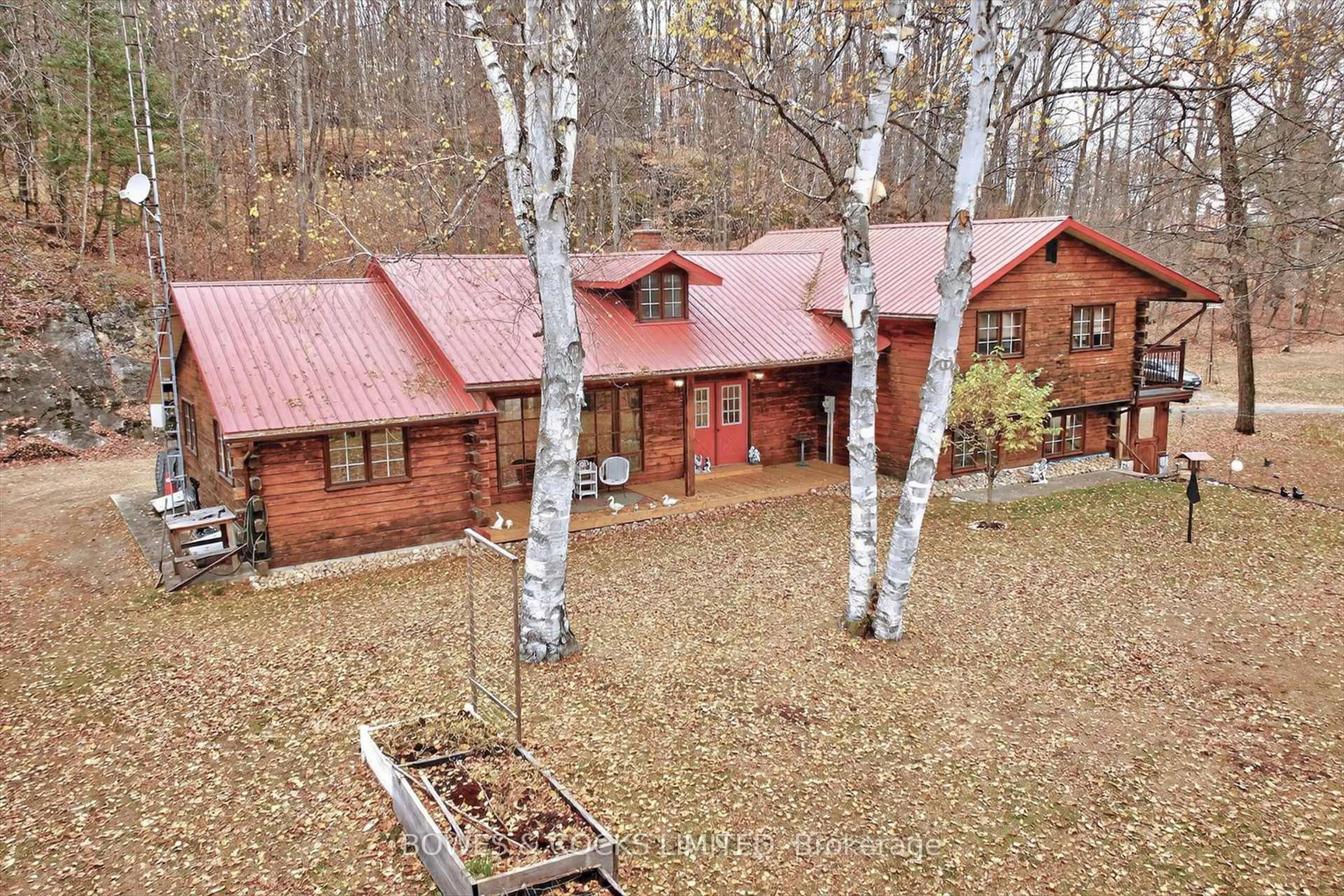 A pic from outside/outdoor area/front of a property/back of a property/a pic from drone, forest/trees view for 82 Bay Lake Rd, Bancroft Ontario K0L 2L0
